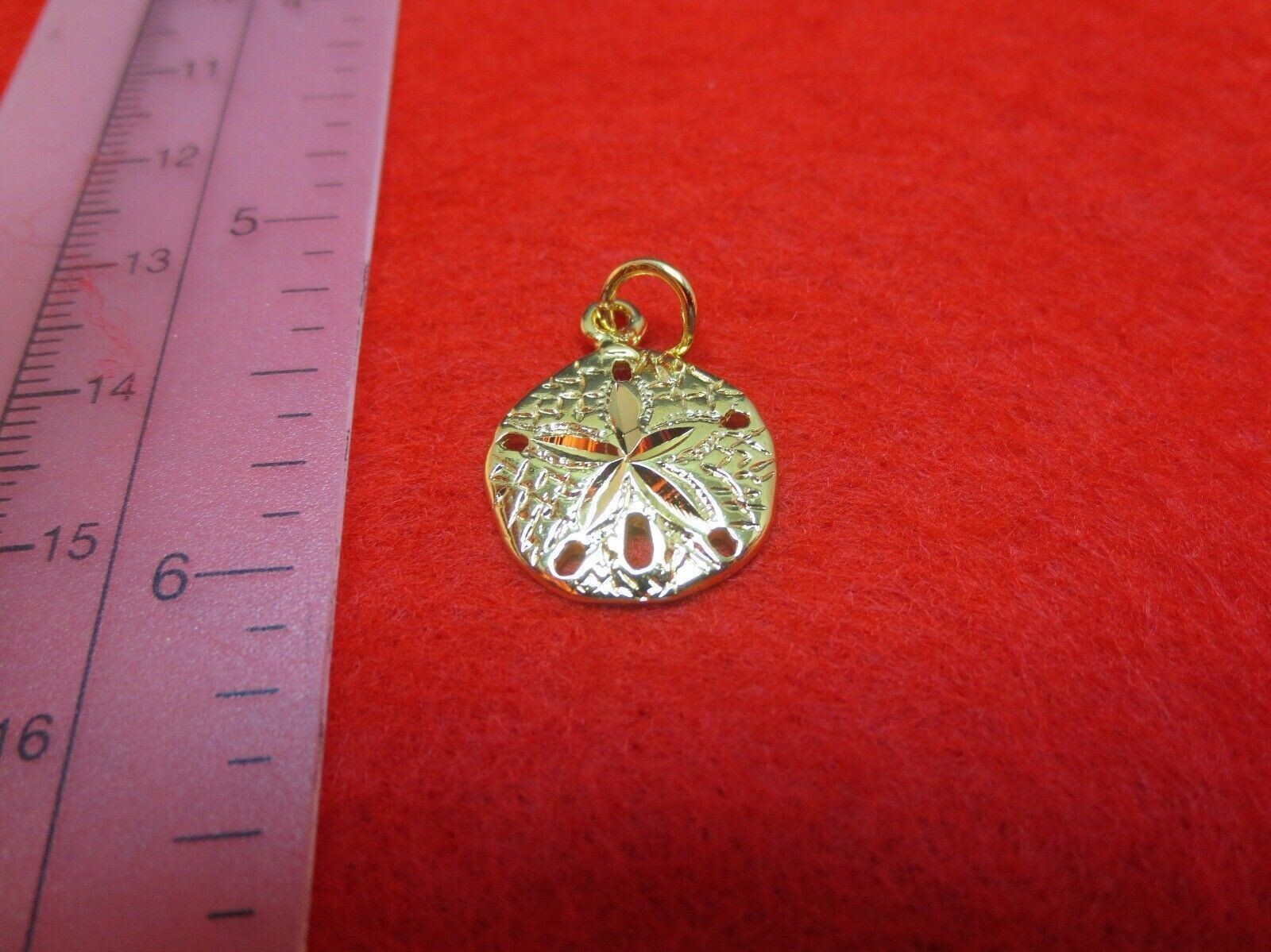 14KT GOLD PLATED SMALL SAND DOLLAR RELIGIOUS CHARM R-2033