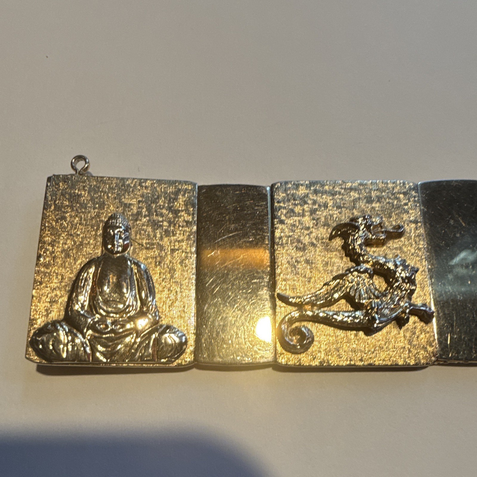 VINTAGE GOLD TONE BUDDHA DRAGON PANEL LINK BRACELET WITH SAFETY CHAIN