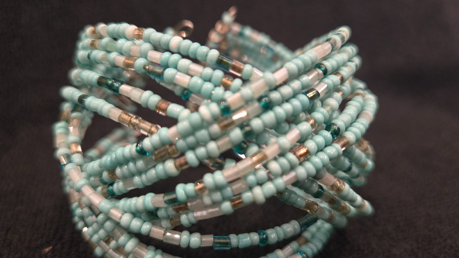 Sky Aqua beaded stretchable, good condition