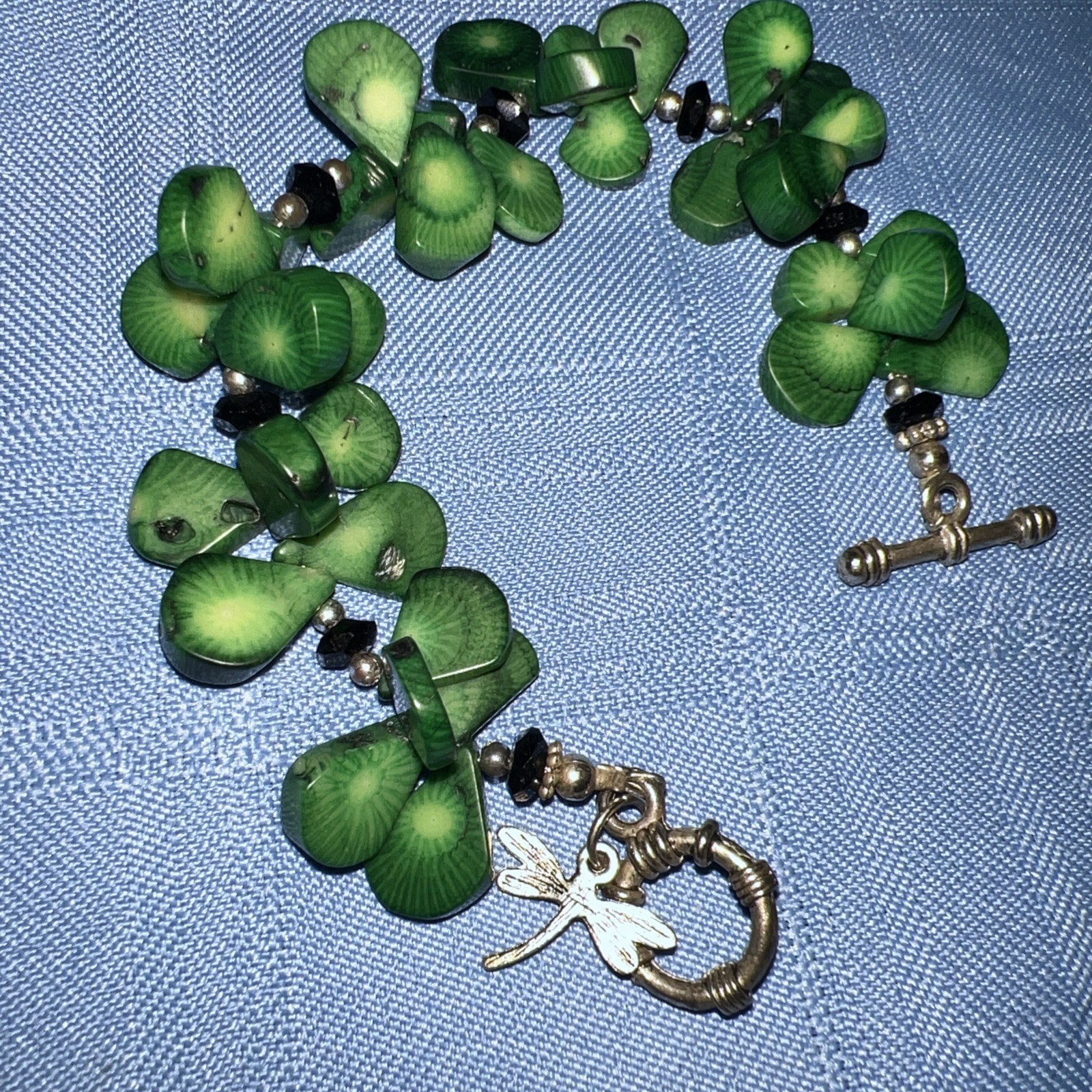 Green Clover Statement Bracelet – Carved Beads, Dragonfly Charm, Toggle Clasp