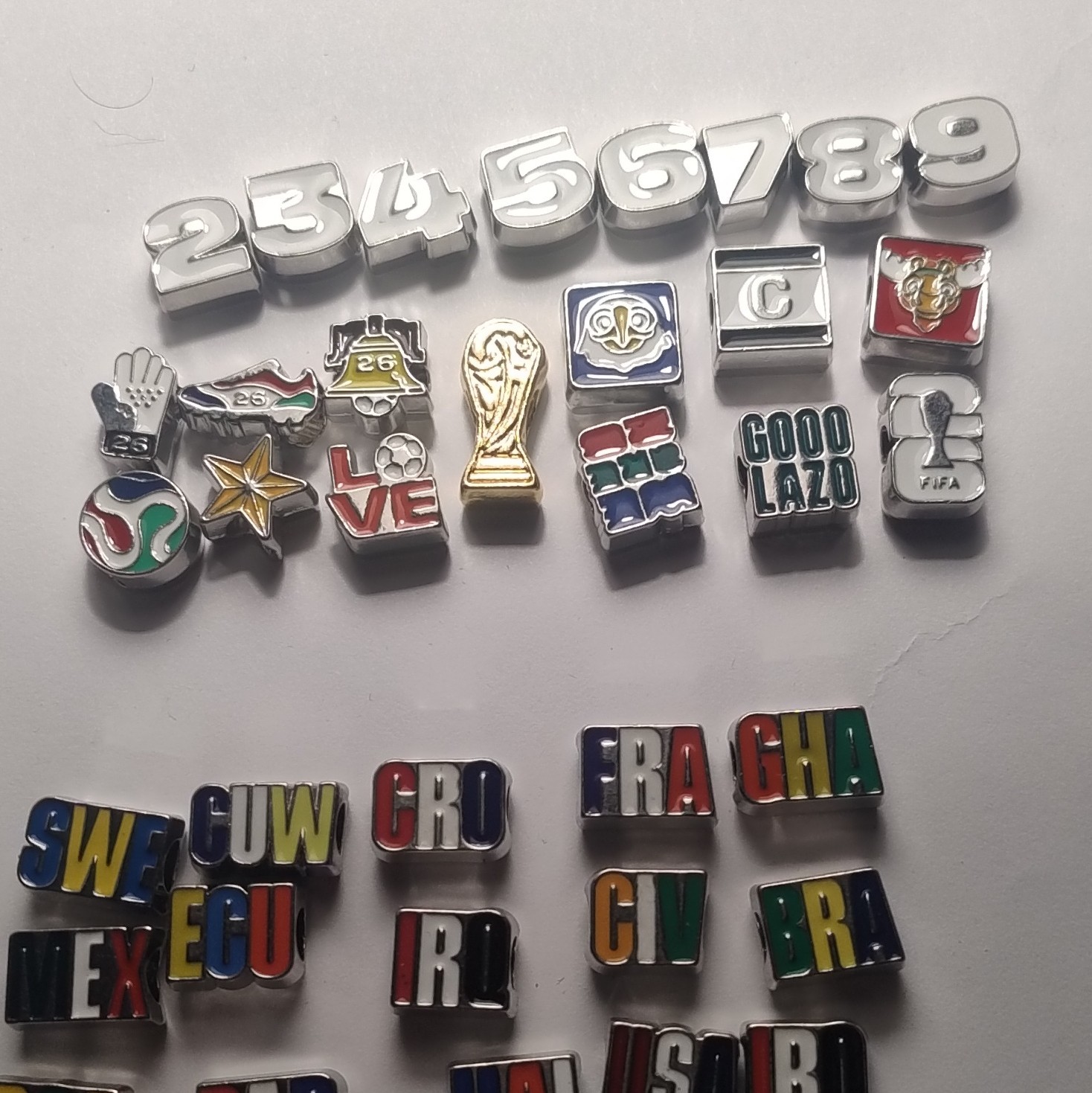 Fifa Charms Bracelets. build a bracelet.5charms,S/L sz blu,black,red no love