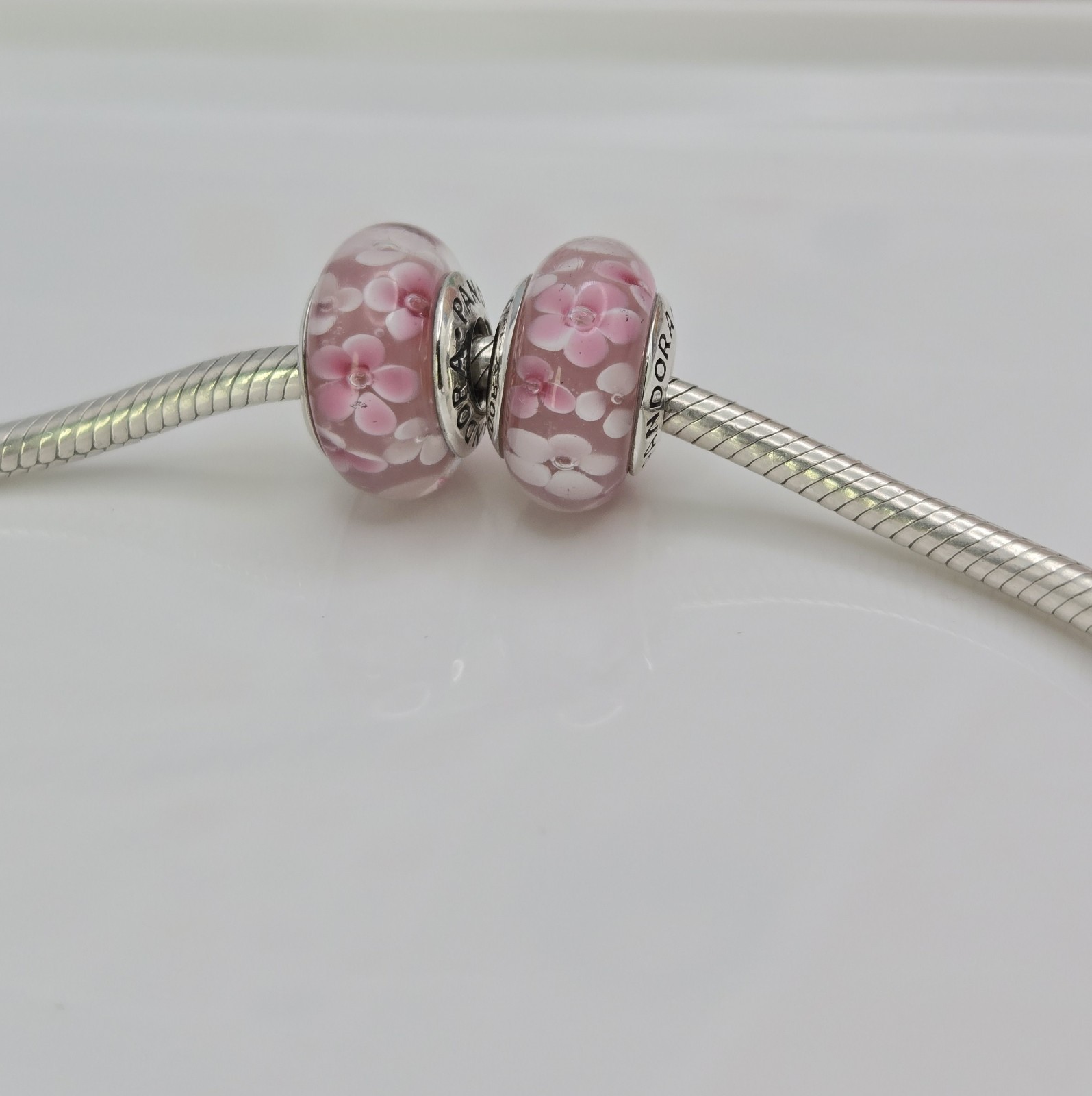 Authentic Pandora Pair of pink flower delicate pink floral Charms Murano Glass