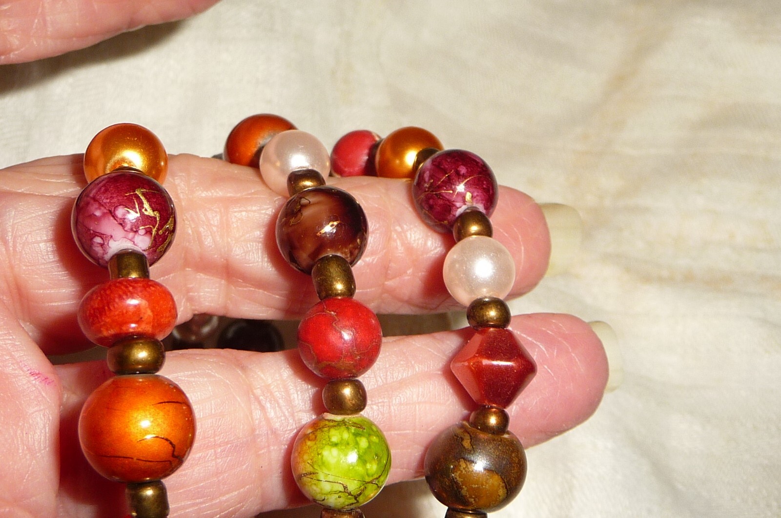#17/4 SPIRAL BRACELET BROWN & ORANGE BEADS