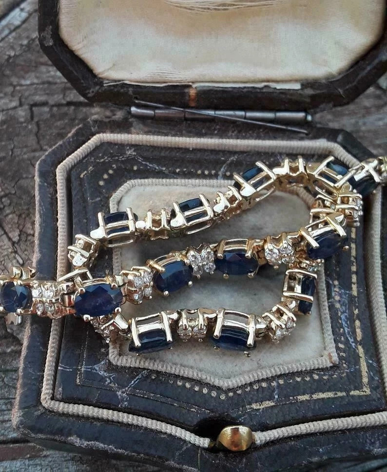 8Ct Oval Simulated Sapphire Women’s Tennis Bracelet In 14K Yellow Gold Plated