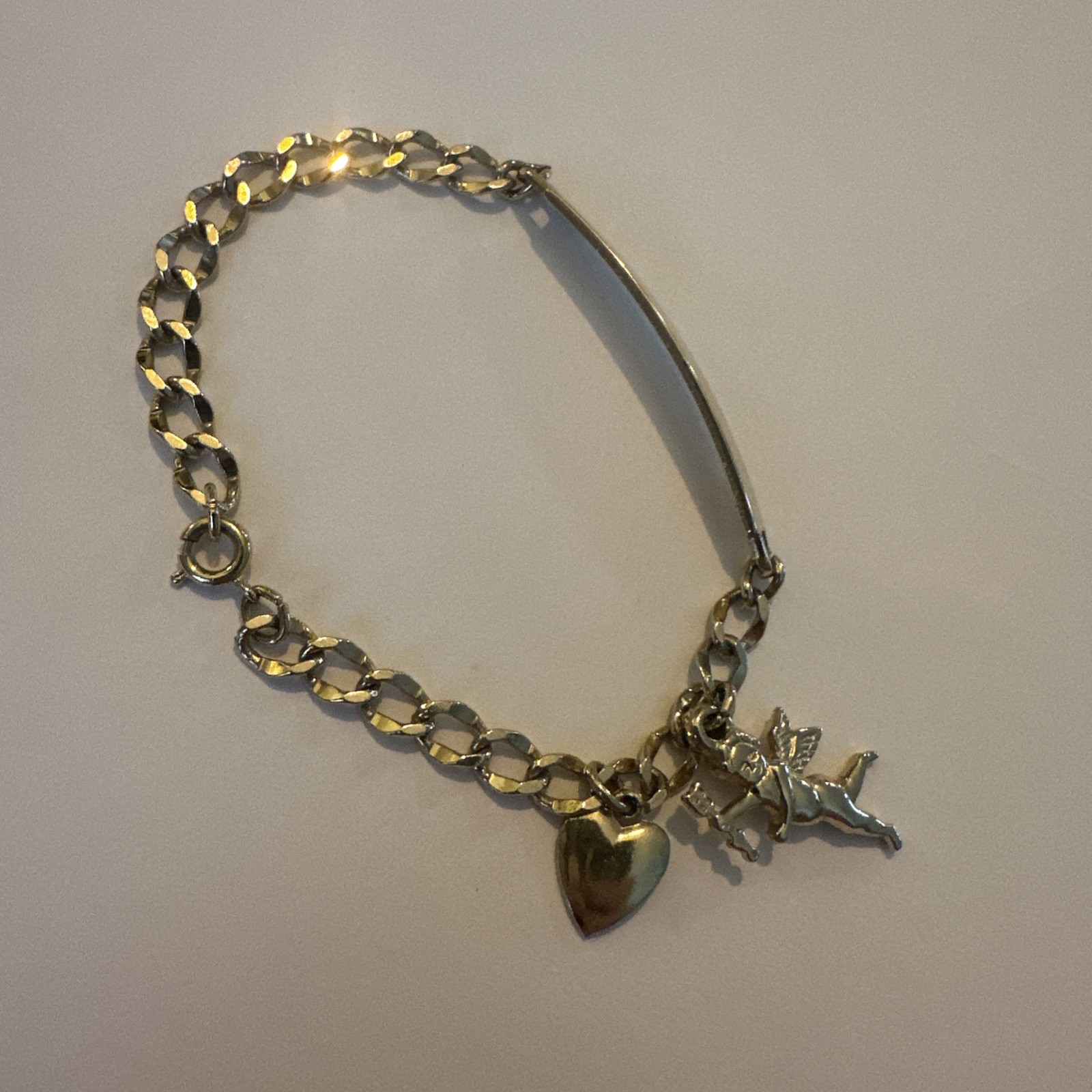 Vintage Speidel female yellow tone ID Bracelet W/ Angle And Heart Charms 7 Inche