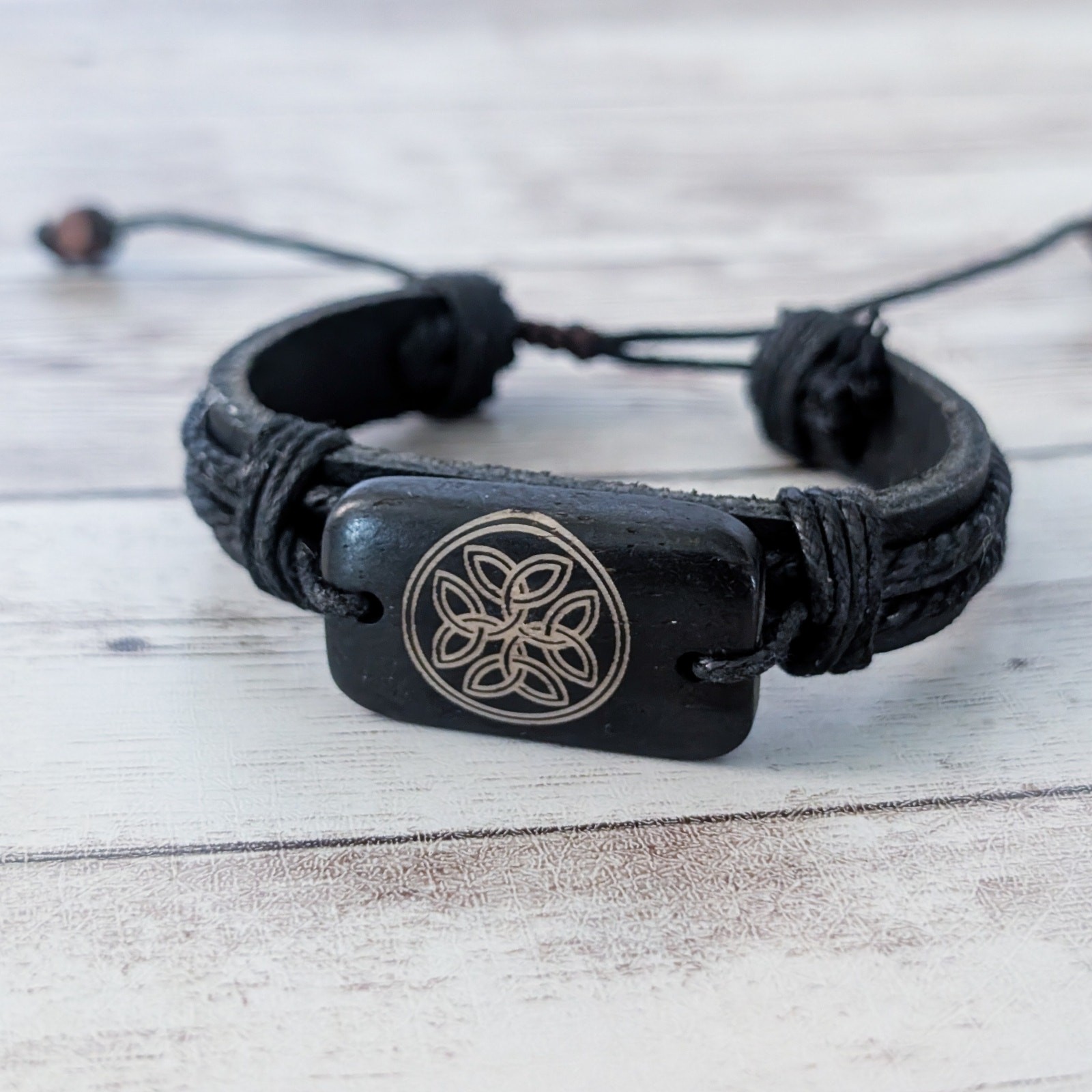 Tie Bracelet with Celtic Like Charm – Leather?