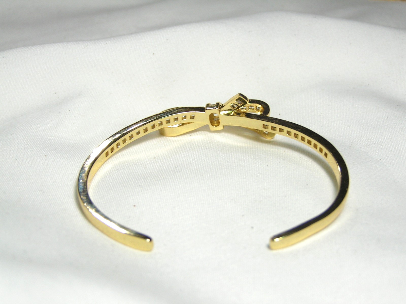 …Beautiful Gold Tone, Channel Set Square Crystals Bow Cuff Bracelet…