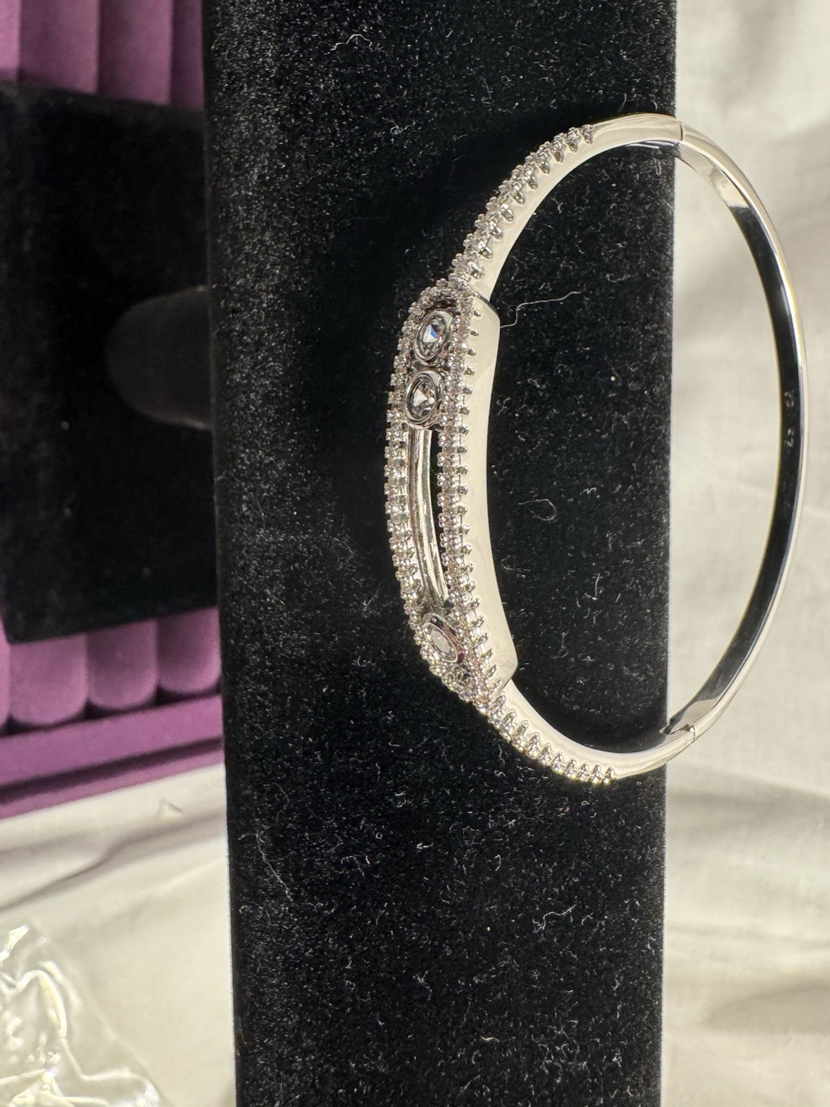 Gold brass plated Silver Tone Hinged Round Metal Bangle with moving CZ stone