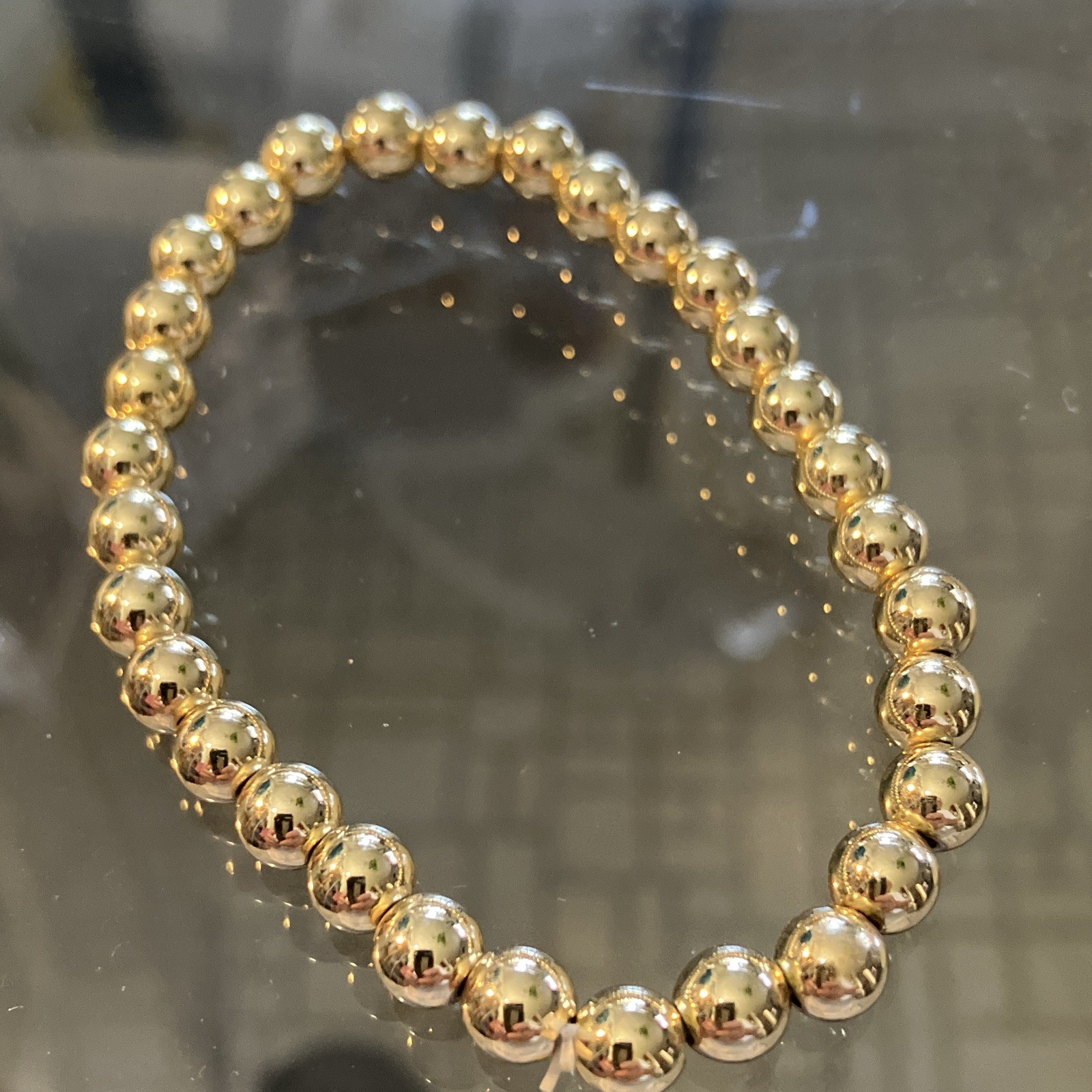 Gold Tone Stretch Ball Bead Bracelet – Stackable, Round, No Clasp.