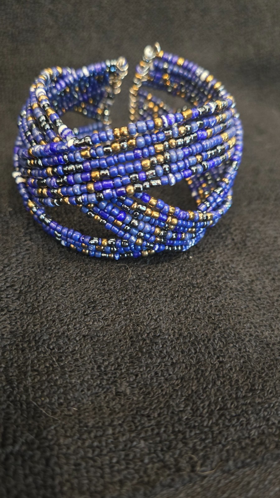 Dark blue beaded retractable, good condition