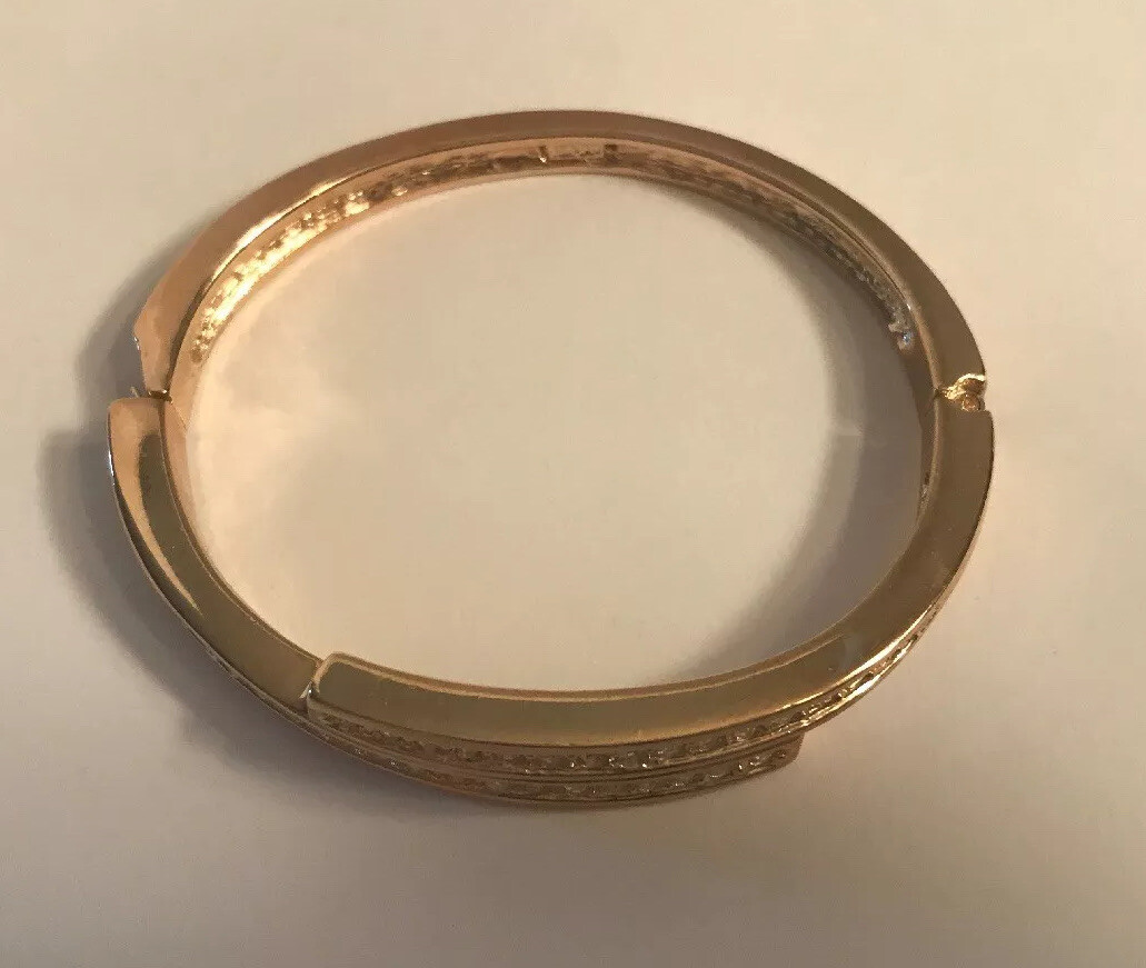 Roman signed Gold toned Overlap Bracelet with CZ stones
