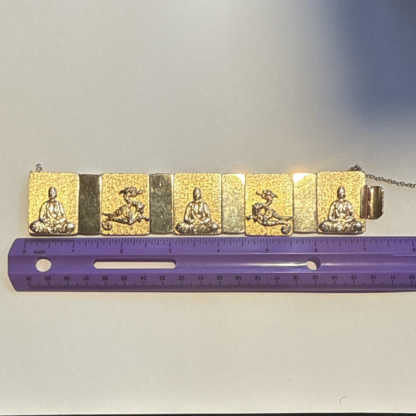 VINTAGE GOLD TONE BUDDHA DRAGON PANEL LINK BRACELET WITH SAFETY CHAIN
