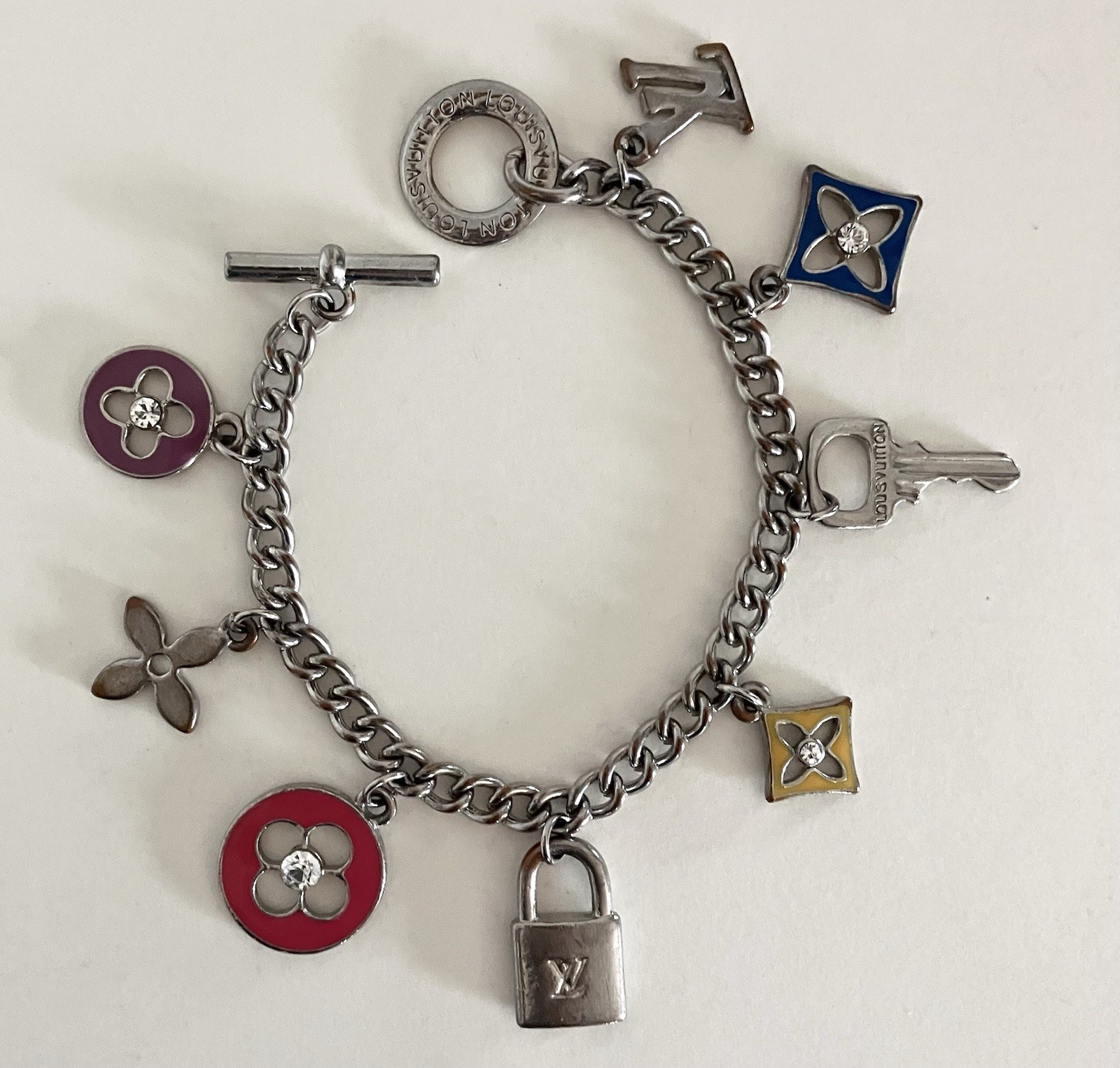 LOUIS VUITTON Vtg RARE Lock & Key, Sweet Monogram Enamel Charm Bracelet 8 Charms