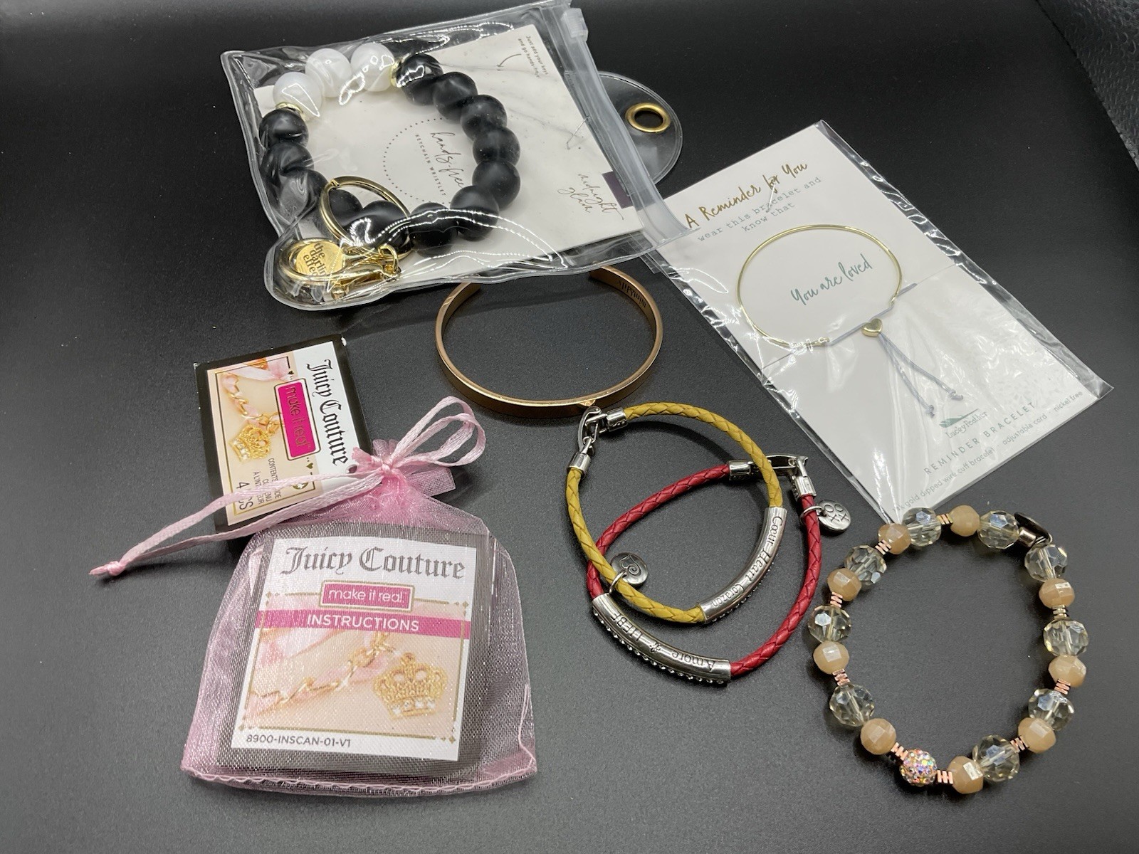 Lot of bracelets-Erimish-Brighton-Lucky Feather-the Darling Effect-Juicy Couture
