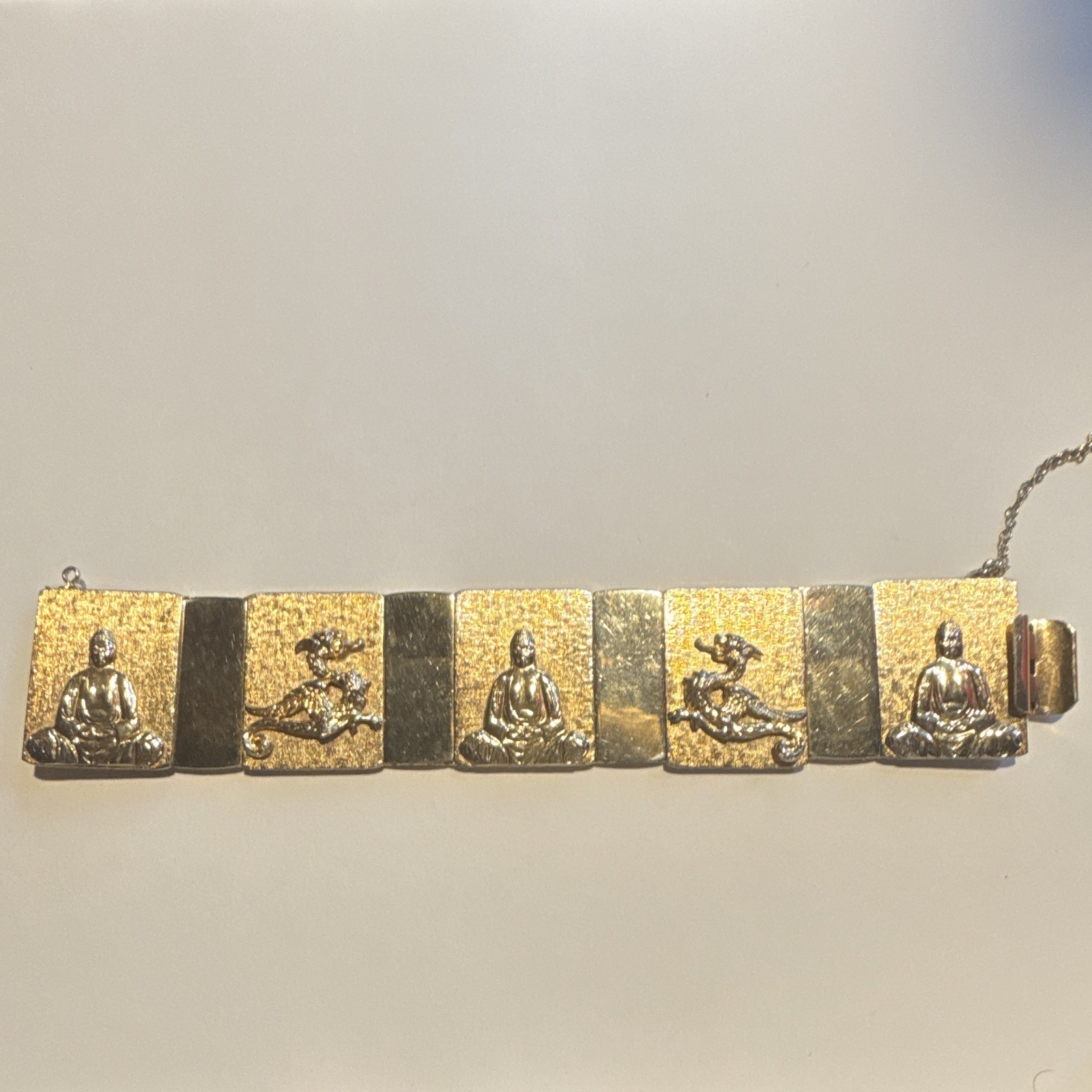 VINTAGE GOLD TONE BUDDHA DRAGON PANEL LINK BRACELET WITH SAFETY CHAIN