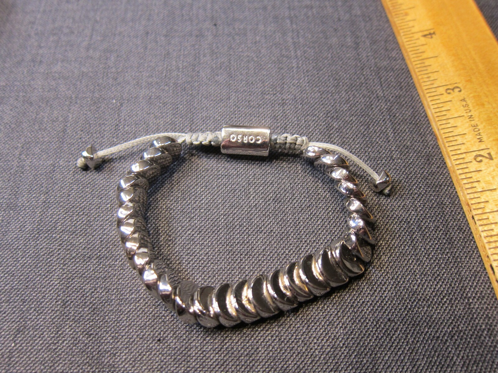 Beautiful Corso pull-to-fit silver-tone discs bracelet gray cording