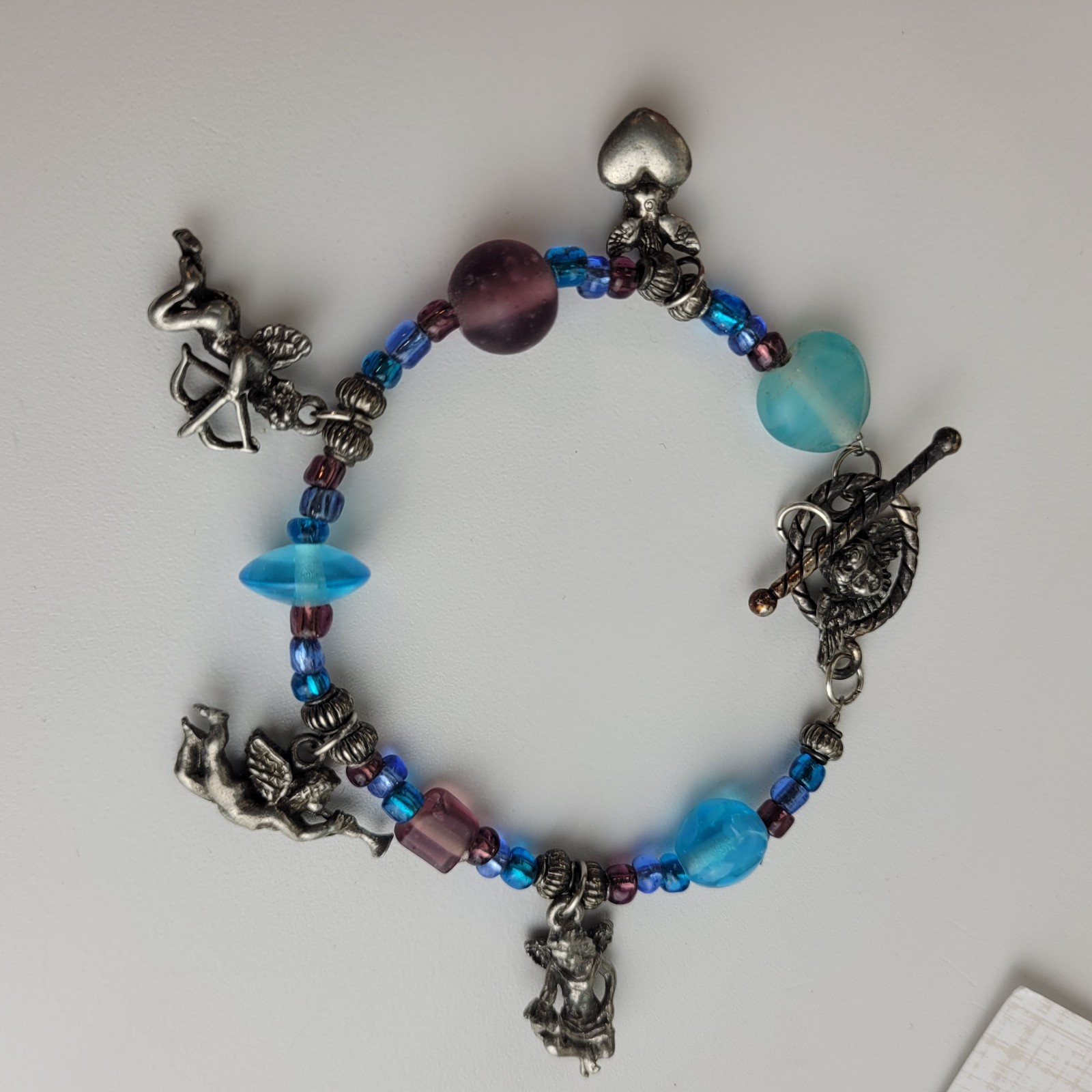 Beaded Angel Charm Bracelet Purple Blue Glass Beads 6.5″ Artisan Made Tarnished