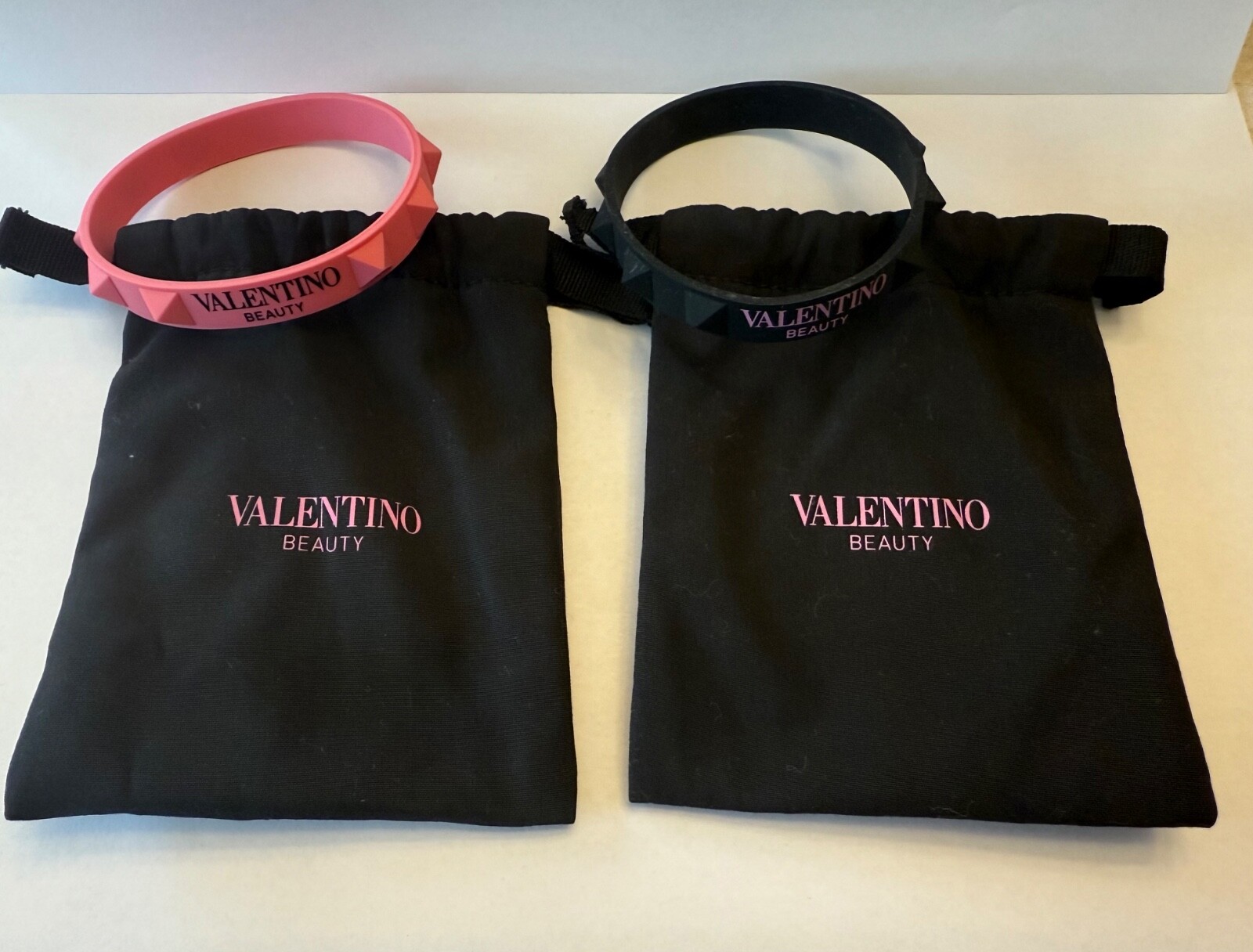 2 PACK! Brand new!Valentino Beauty Black and Pink Silicone Studded Bracelet-NEW