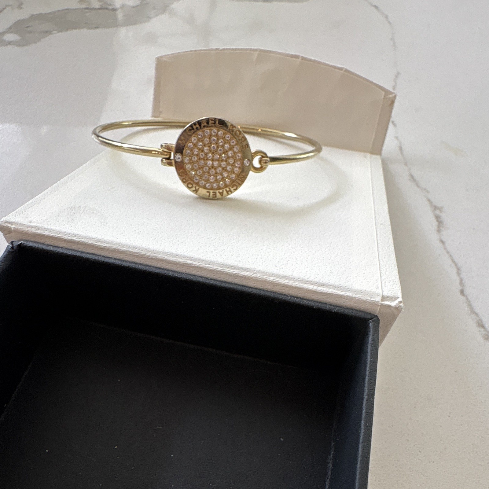 Michael Kors Gold Tone Hinged Clip Bangle Bracelet with MK Signed Clasp Thin