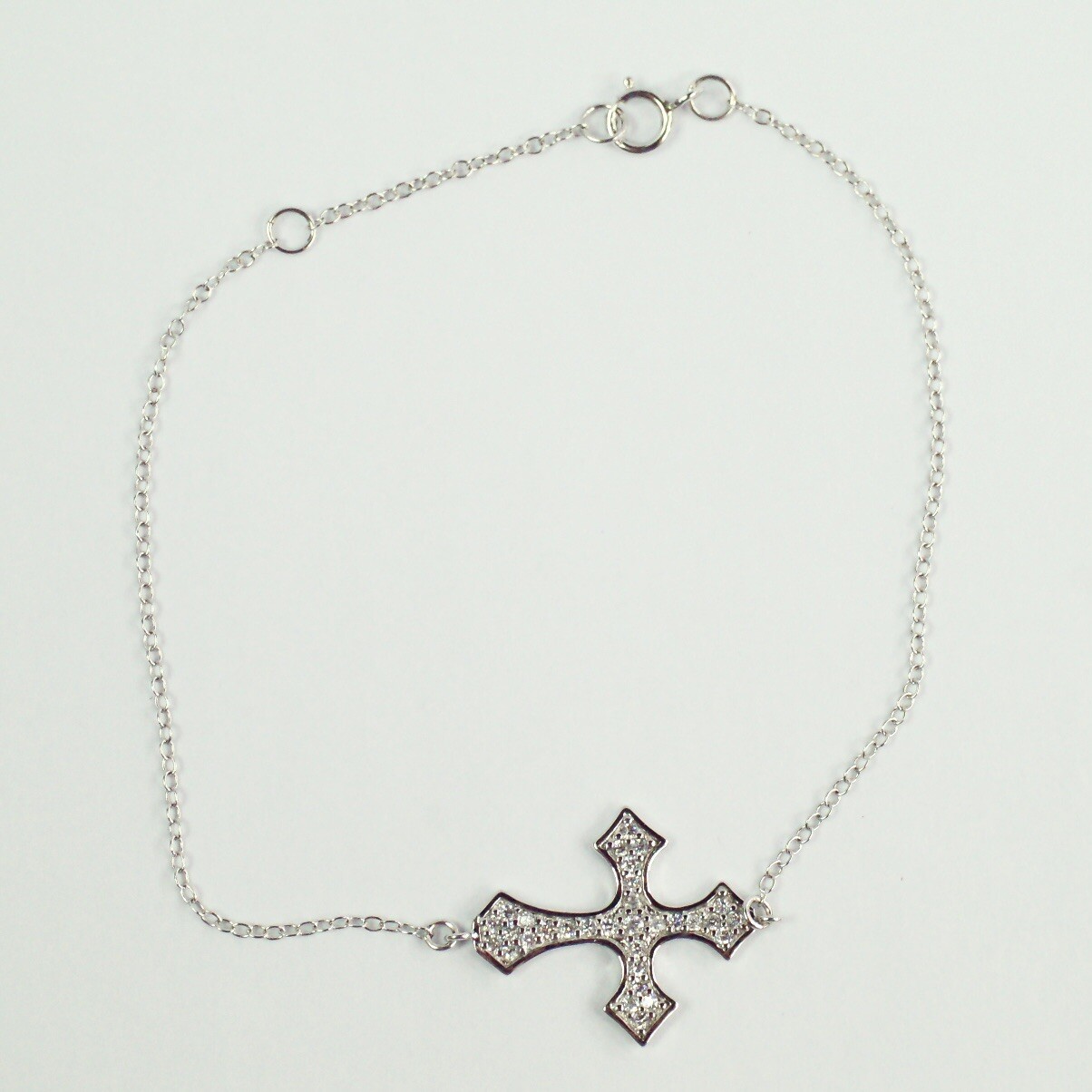 Sterling silver white/colorless CZ pavé cable chain cross bracelet