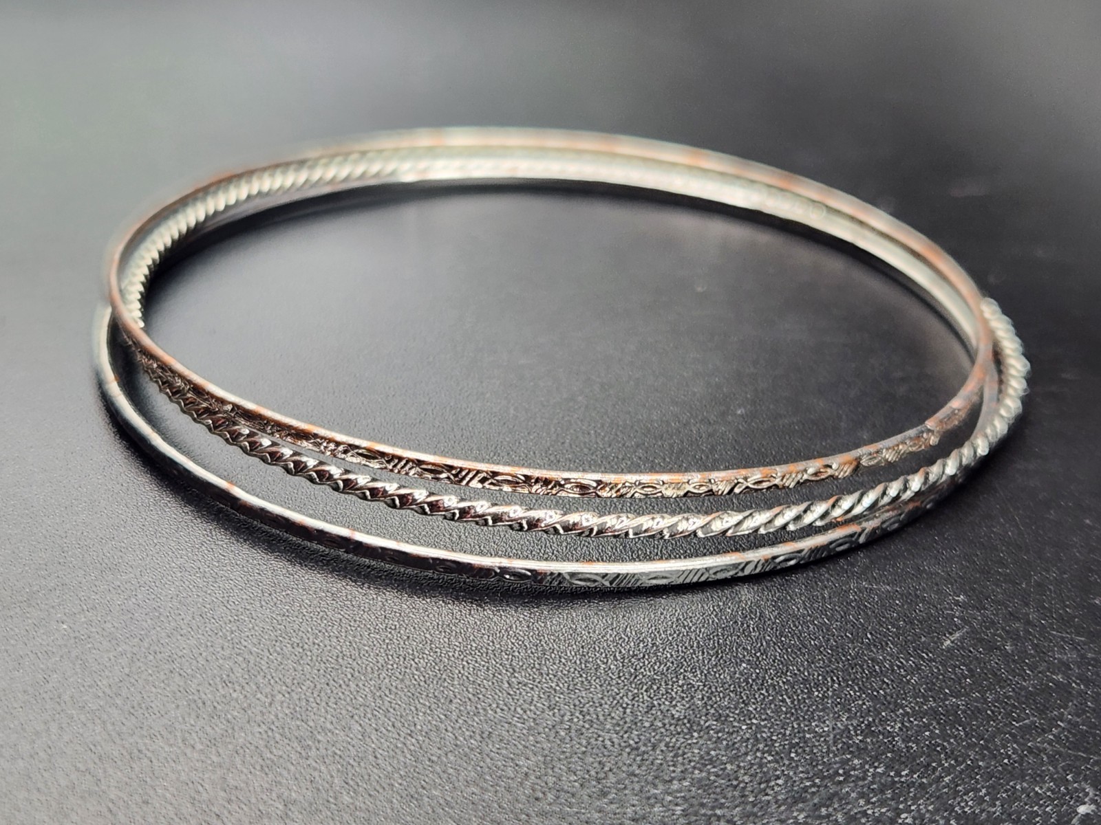 #0366 – 3 Silver Tone Textured Stacking Bangle Bracelets Size 7.5 Mixed Pattern