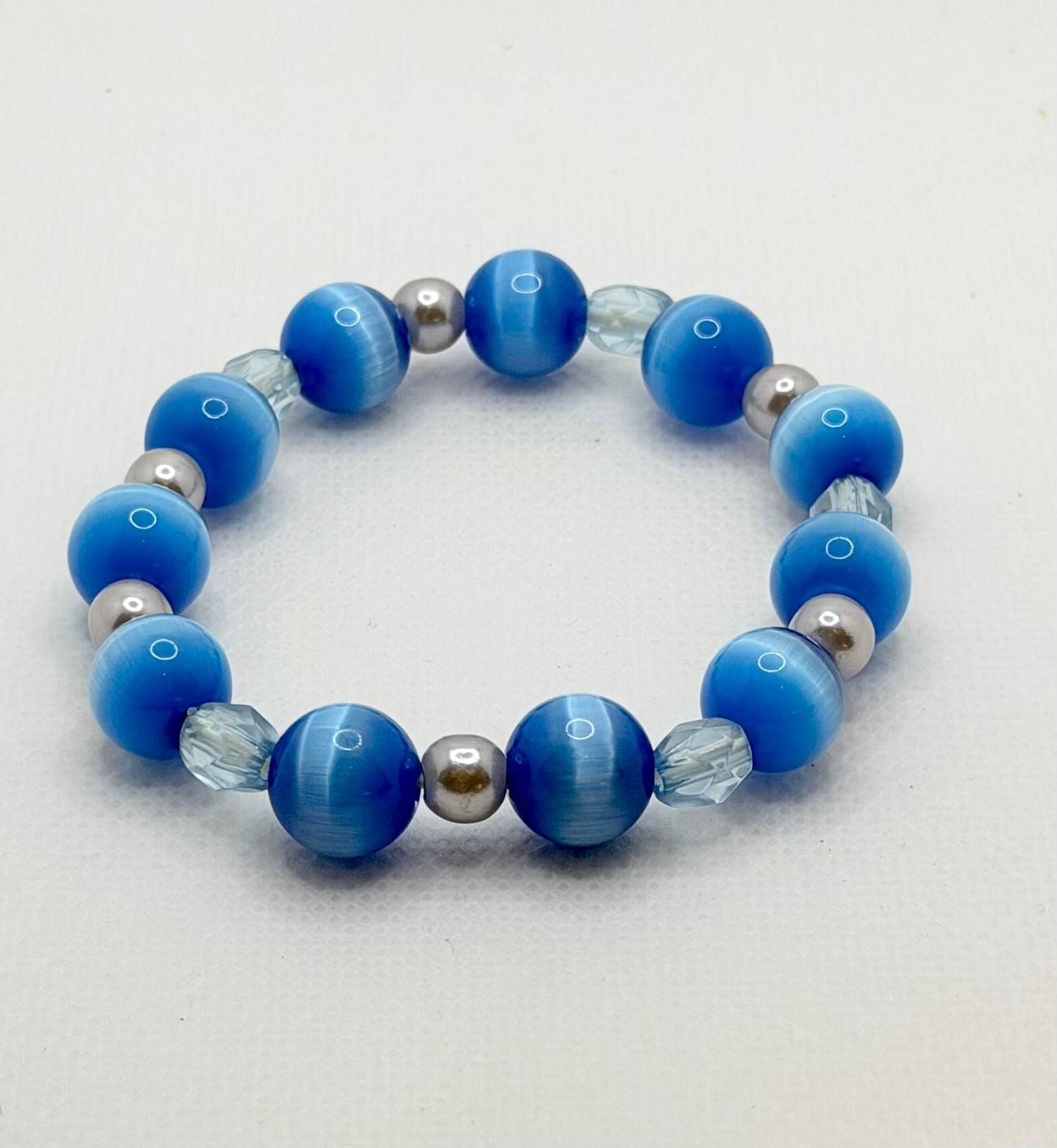 Fiber Optic Blue Cat Eye Style Beaded Stretch Bracelet Silver Tone & Clear Beads