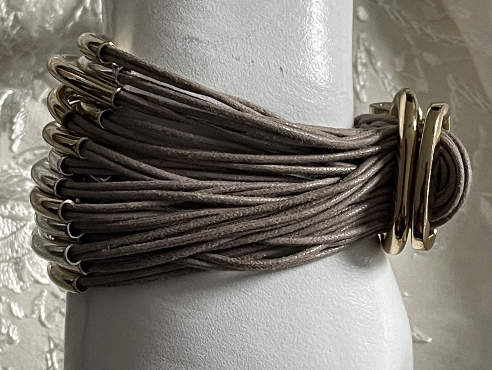 Gorgeous Gillian Julius 20 Silver/Gold Tube Taupe Cord Strand Bracelet