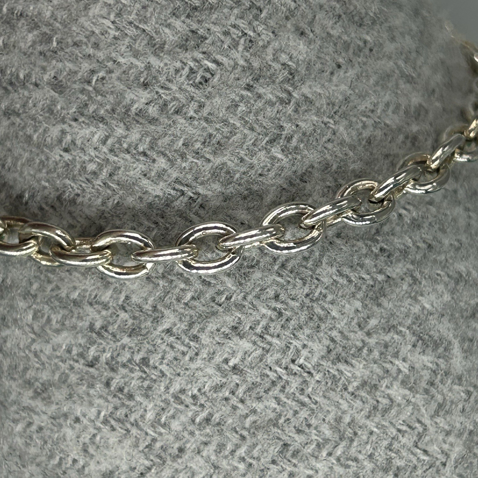 Ciclon bracelet silver plated green droplet charm oval link chain Spanish