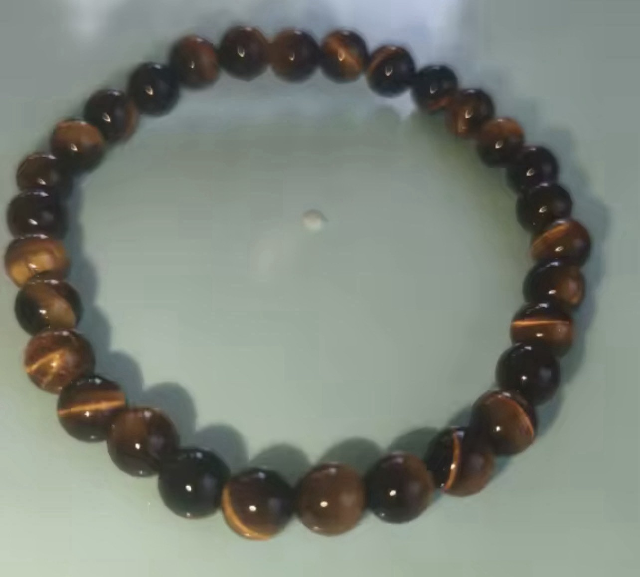 Beaded bracelet with natural Tiger’s Eye gemstone, brown/yellow, 8mm
