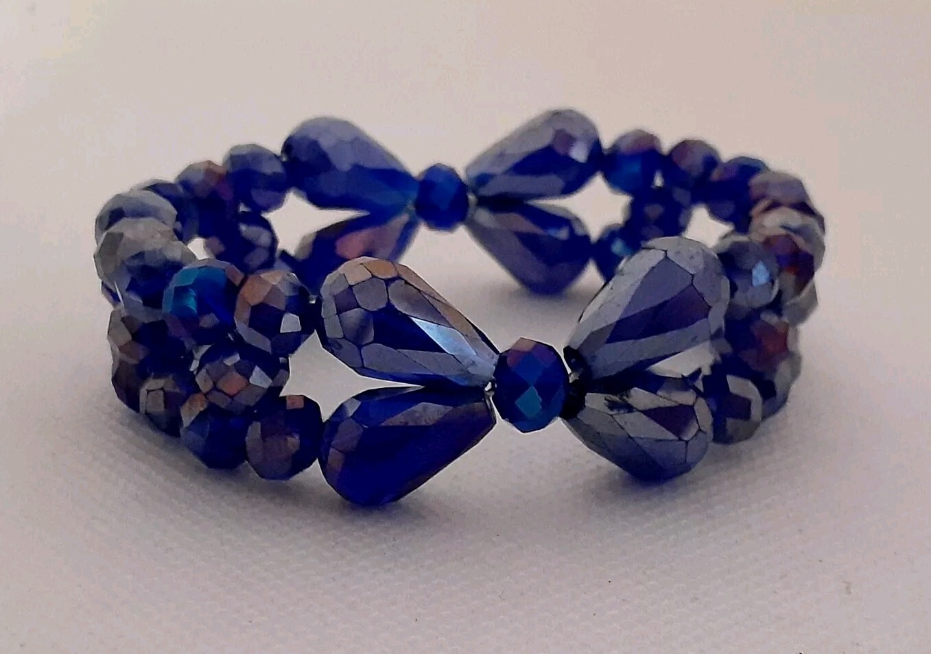 Multi Faceted glass Blue Bow Design Bead Stretch Bracelet