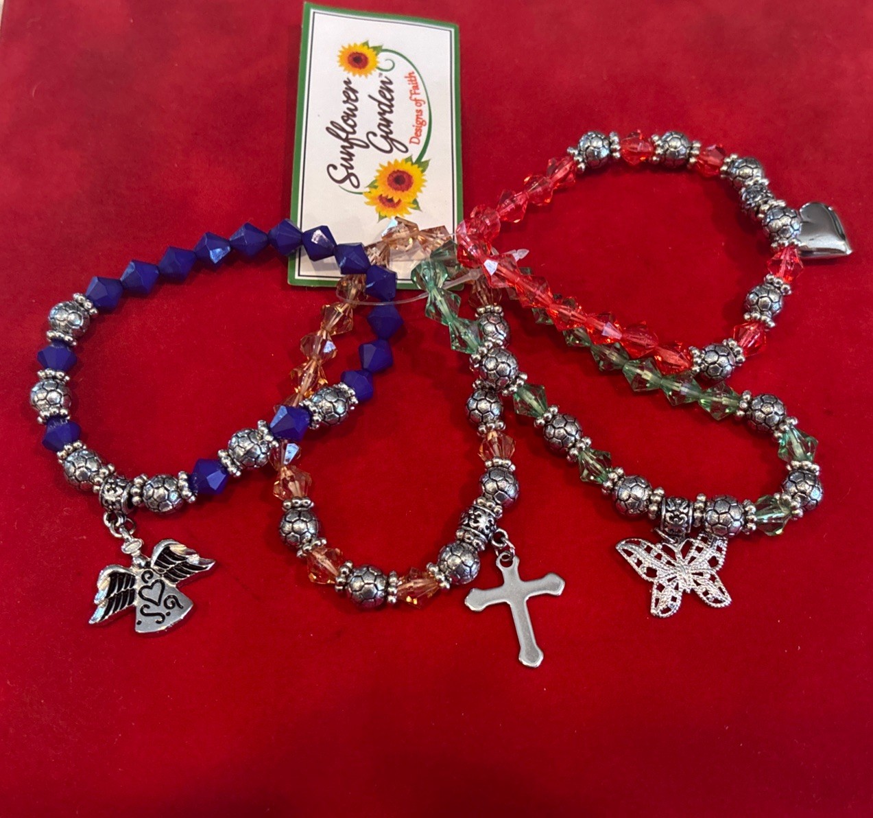 Set Of 4 Stretch Charm Bracelets Red Blue Green Yellow NWOT