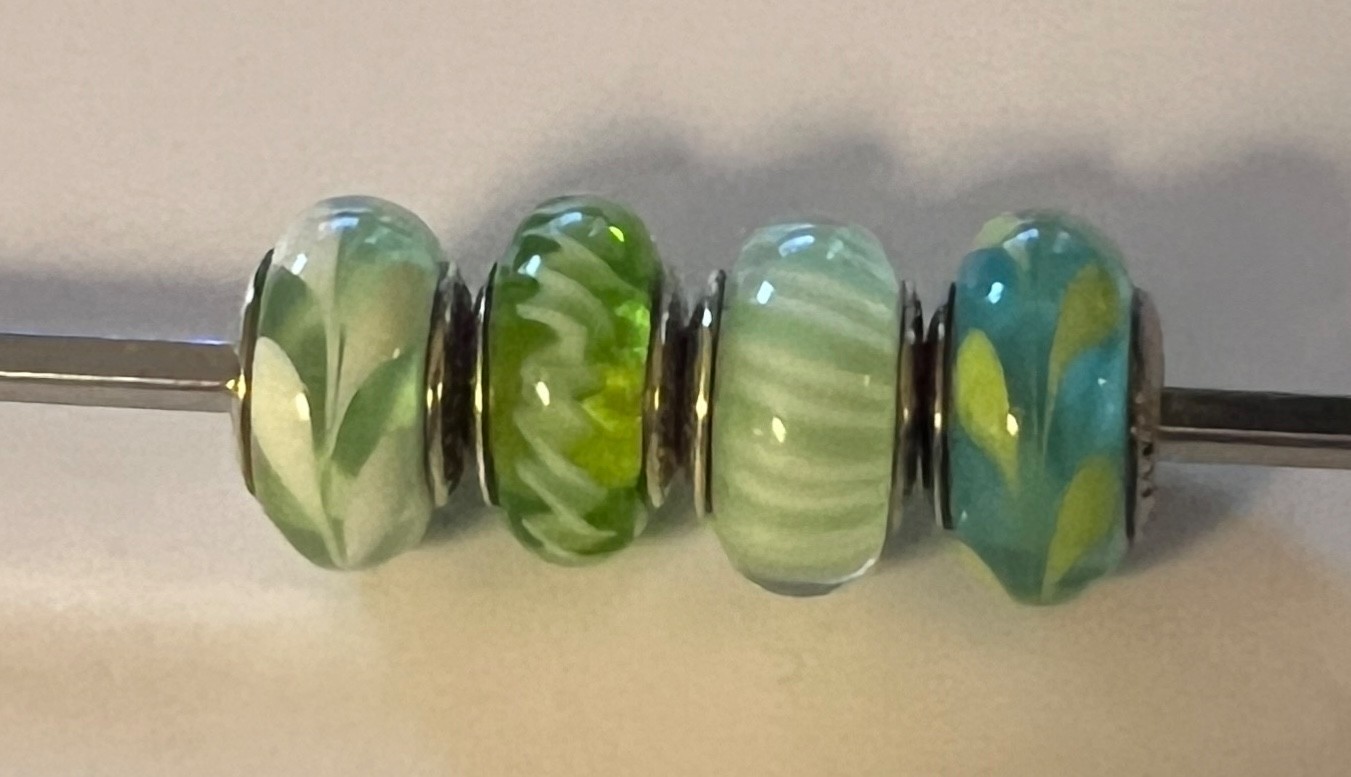 Set of 4 retired Pandora green Murano charms – complete descriptions listed