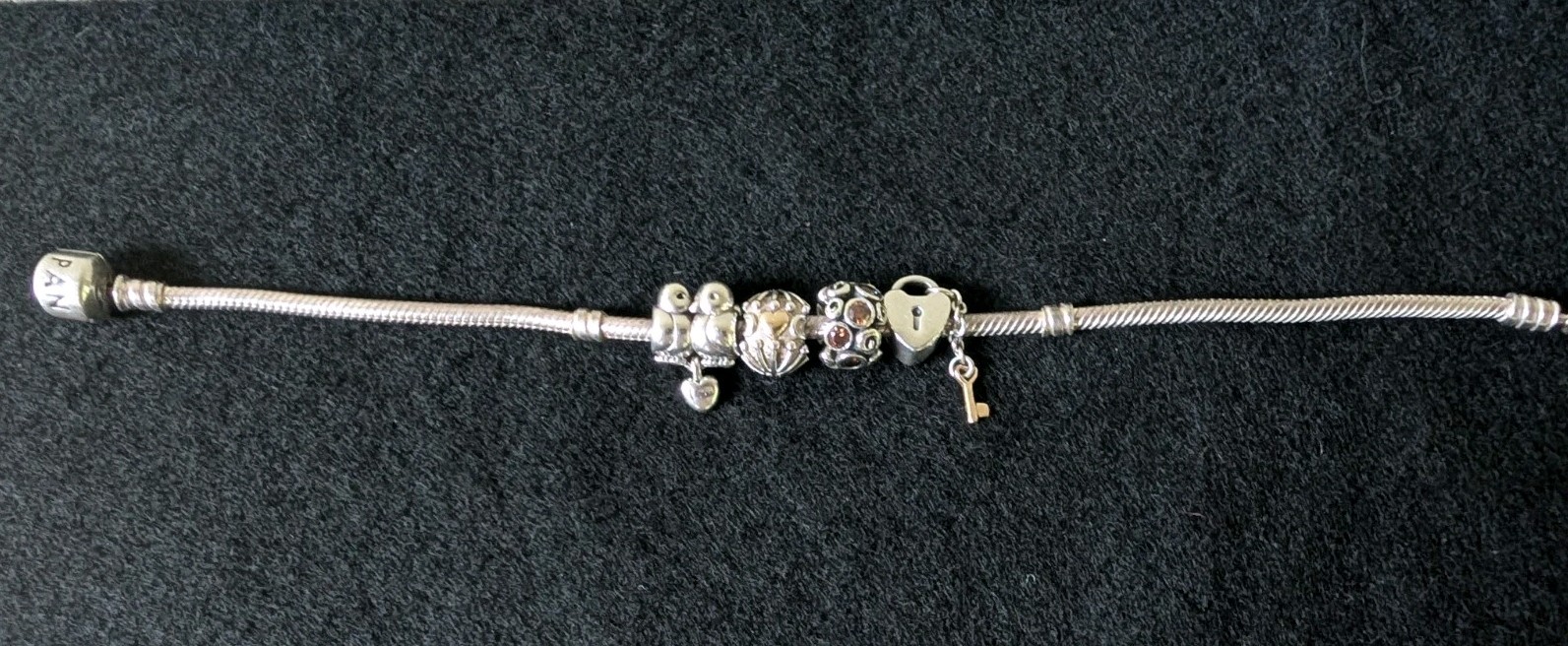 PANDORA Sterling Silver Snake Chain Charm Bracelet With 4 “Love” Themed Charms