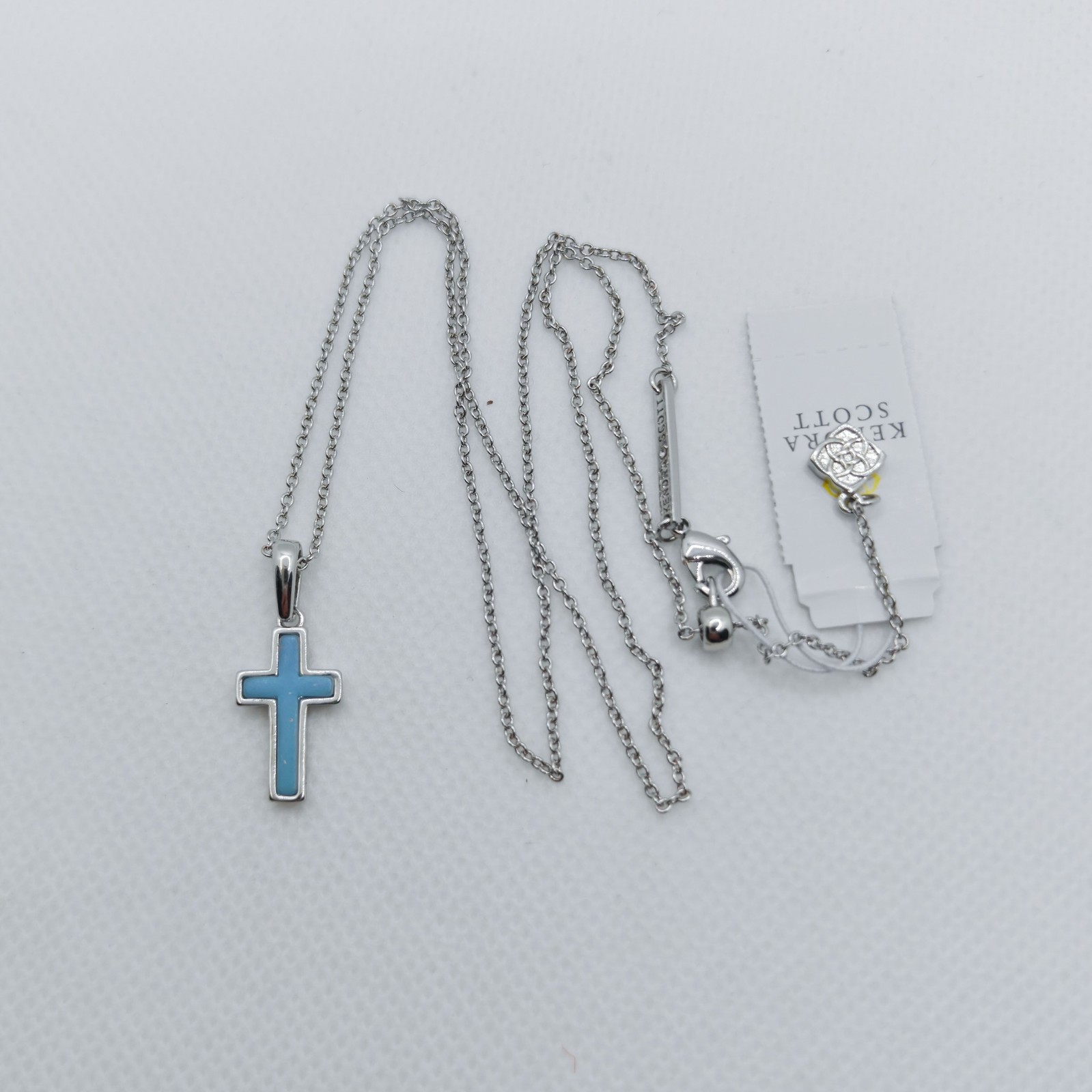 New Kendra Scott Cross Silver Pendant Necklace in Light Blue Dichroic Glass
