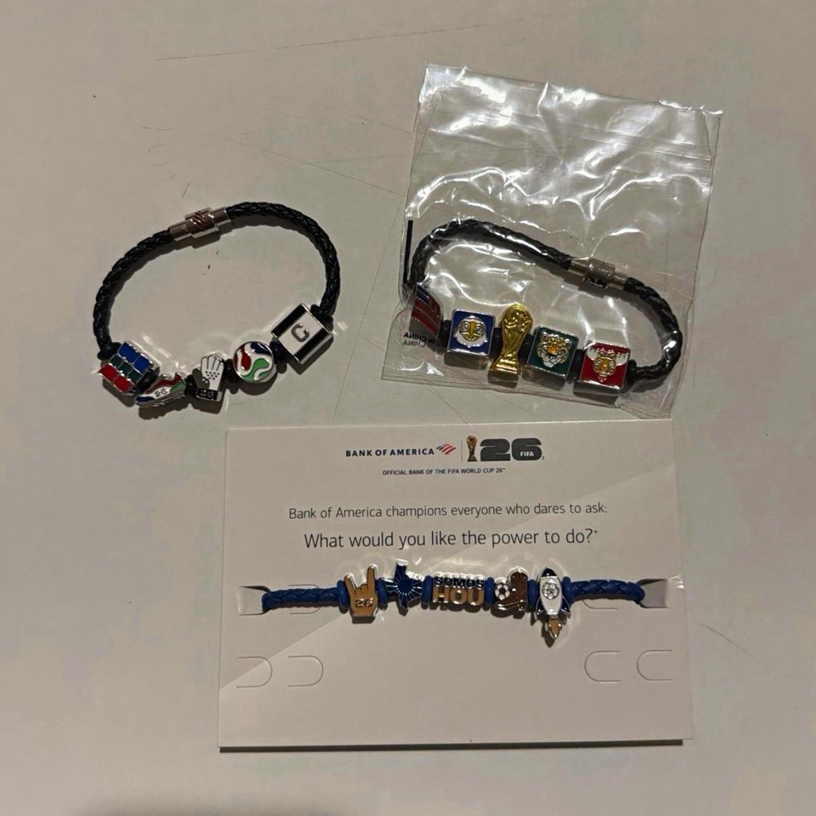 FIFA bracelet with all unique Houston charms + 2 FIFA bracelets
