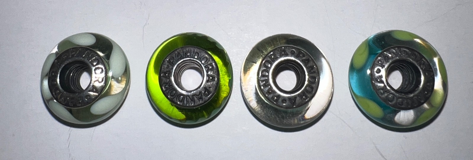 Set of 4 retired Pandora green Murano charms – complete descriptions listed