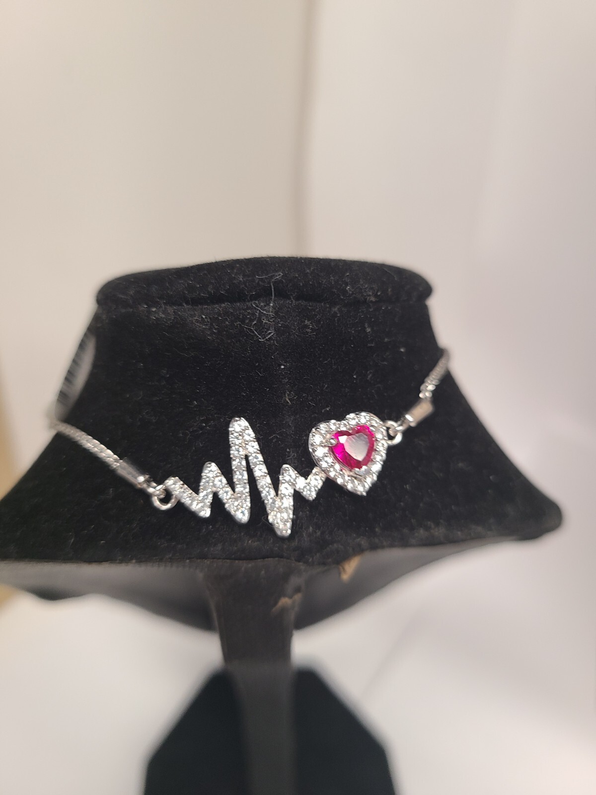 5.0mm Heart-Shaped Lab-Created Ruby and White Sapphire Frame Heartbeat Bolo Brac