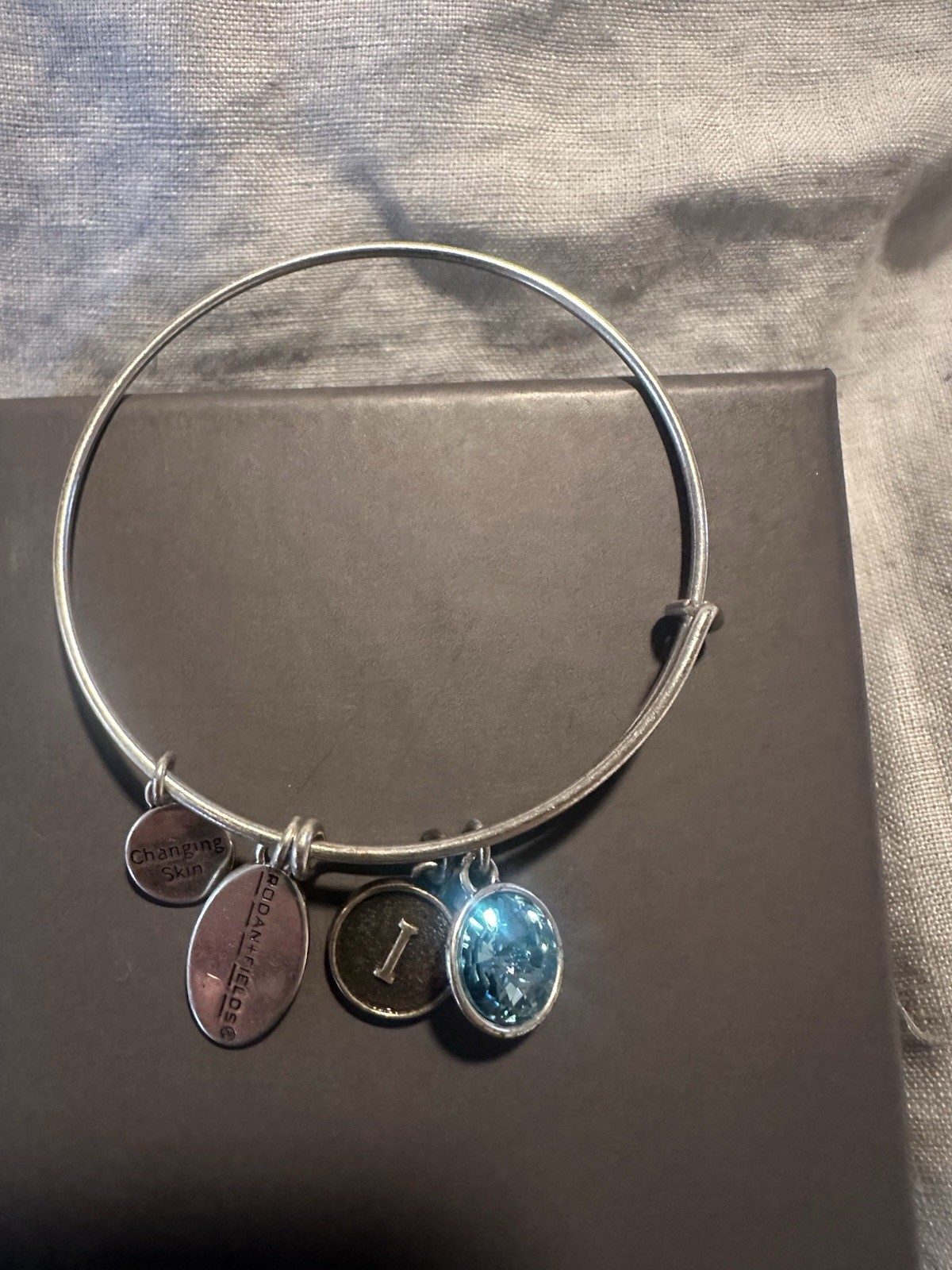 Rodan + Fields R+F Alex and Ani Bracelet Changing Lives I Blue Charm NEW