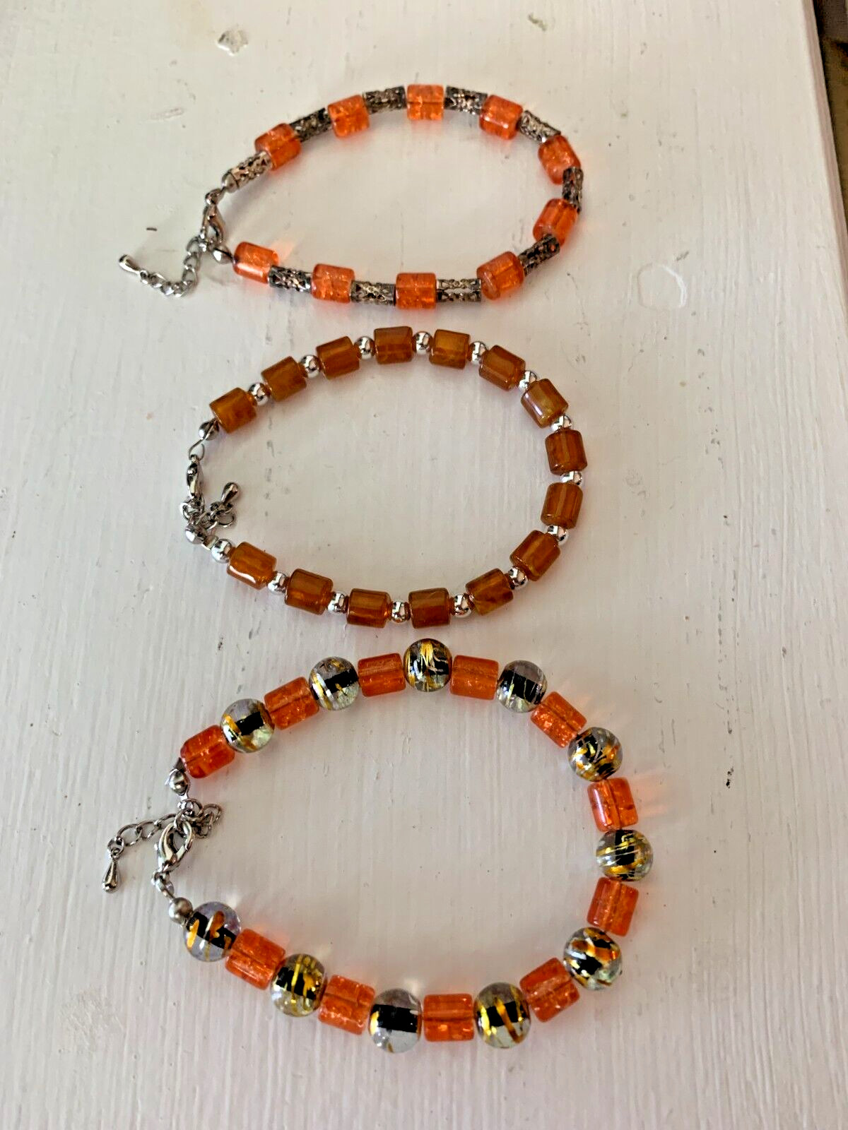 Woman’s Beaded Orange / Brown Colored Bracelets set of 3