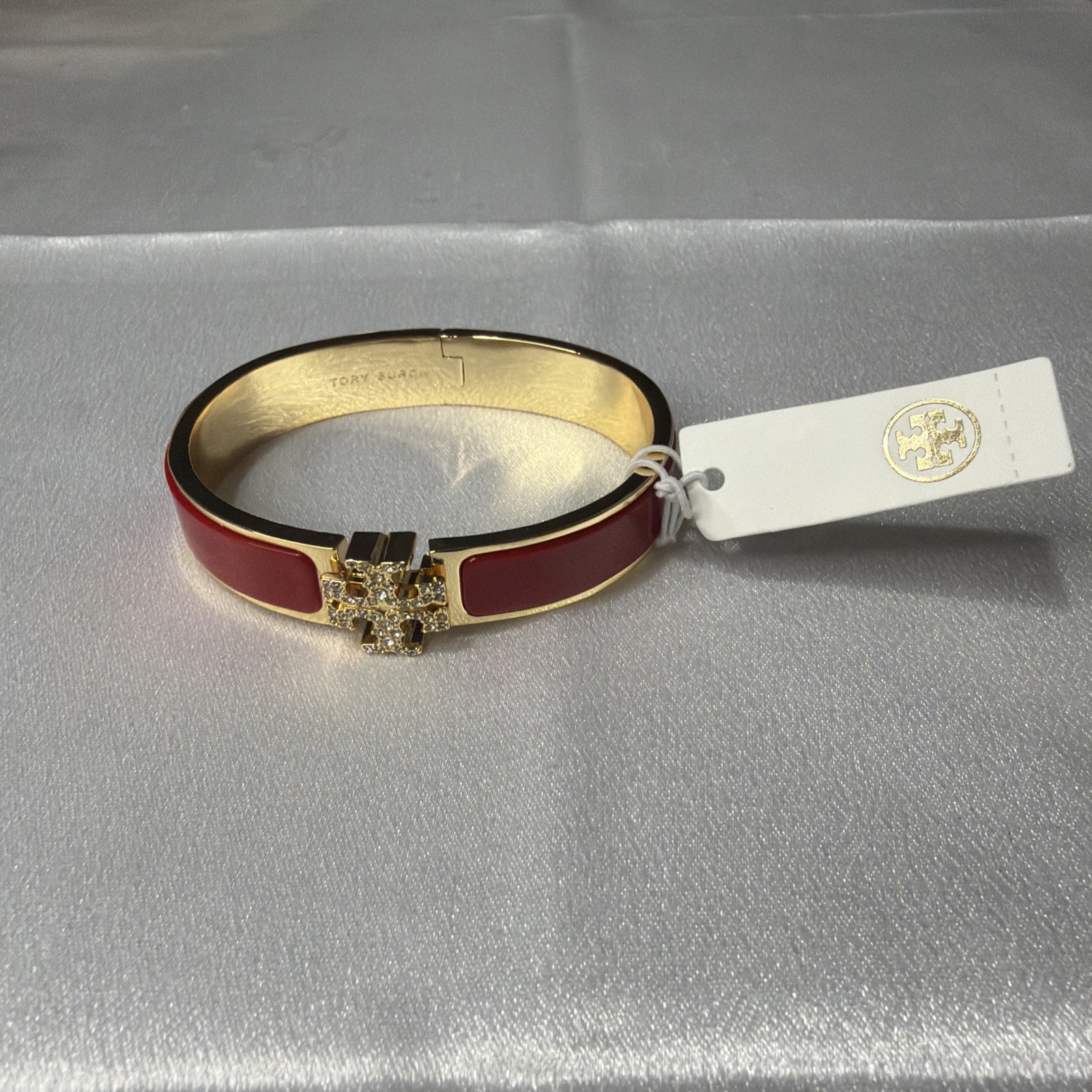 Brand new Tory Burch gold and red bracelet