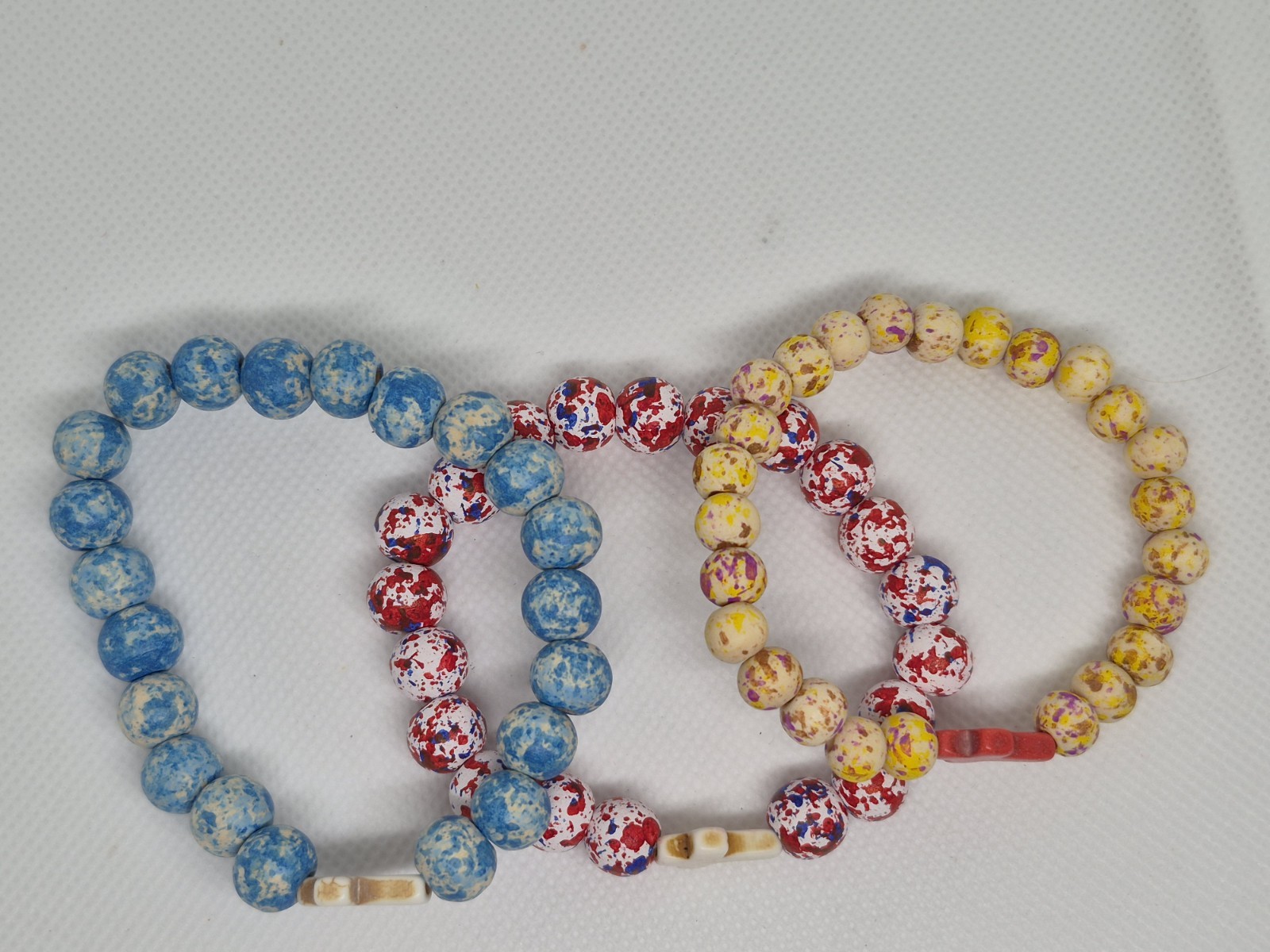 Set of 3 Multicolor wood Round Beaded Stretch Bracelets w/ Cross Dangle Charms
