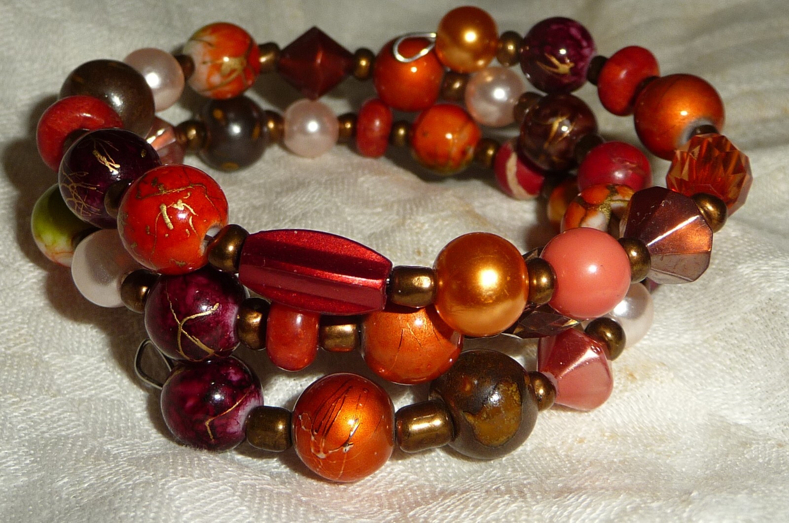 #17/4 SPIRAL BRACELET BROWN & ORANGE BEADS