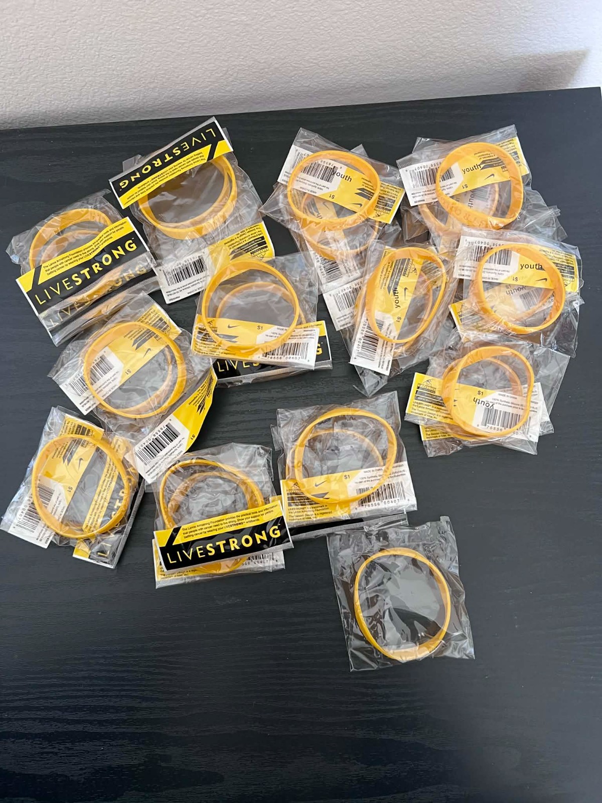Lot of 24 – Nike Live Strong Lance Armstrong Rubber Wristband – Adult/Youth Size