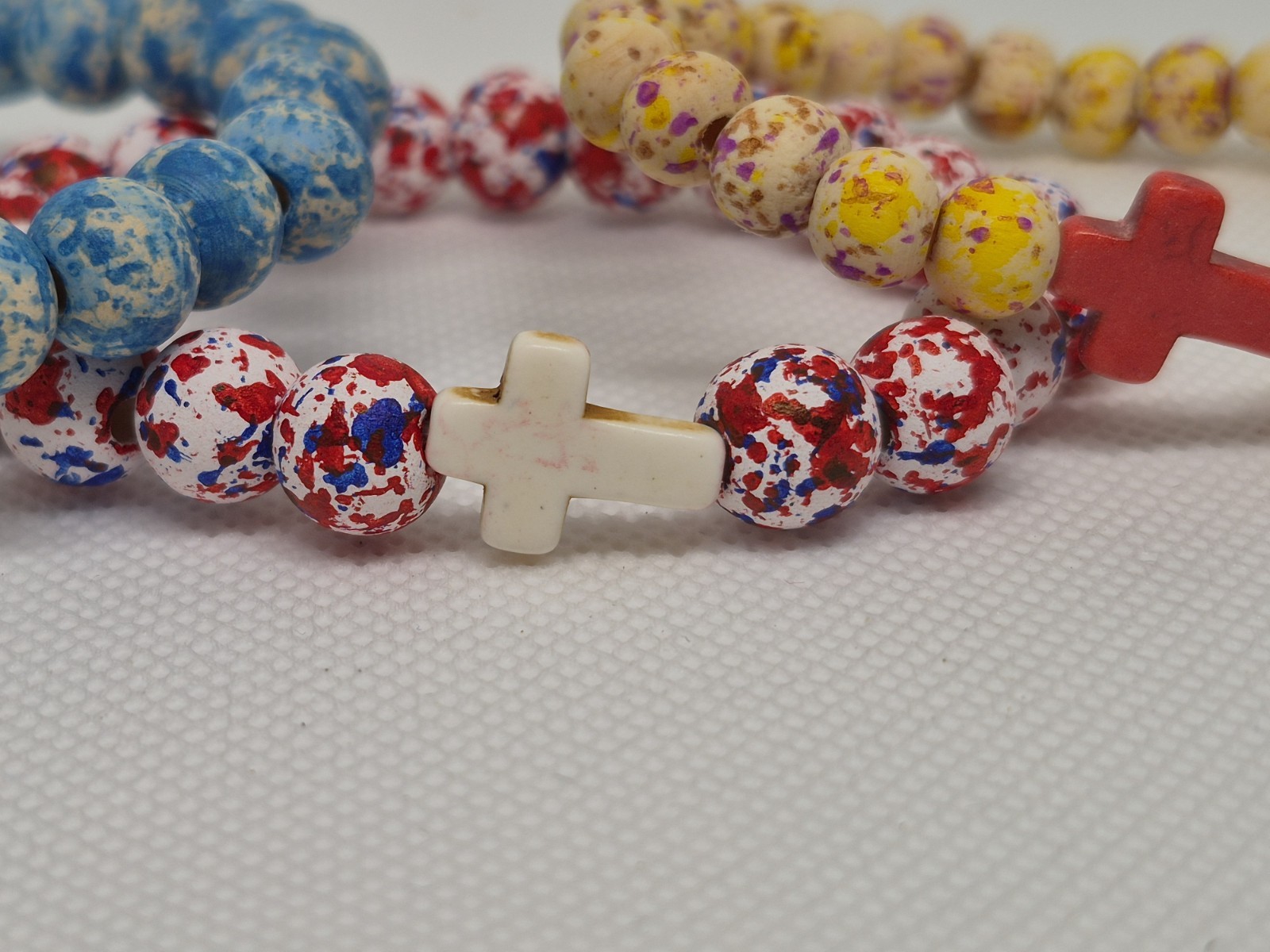 Set of 3 Multicolor wood Round Beaded Stretch Bracelets w/ Cross Dangle Charms