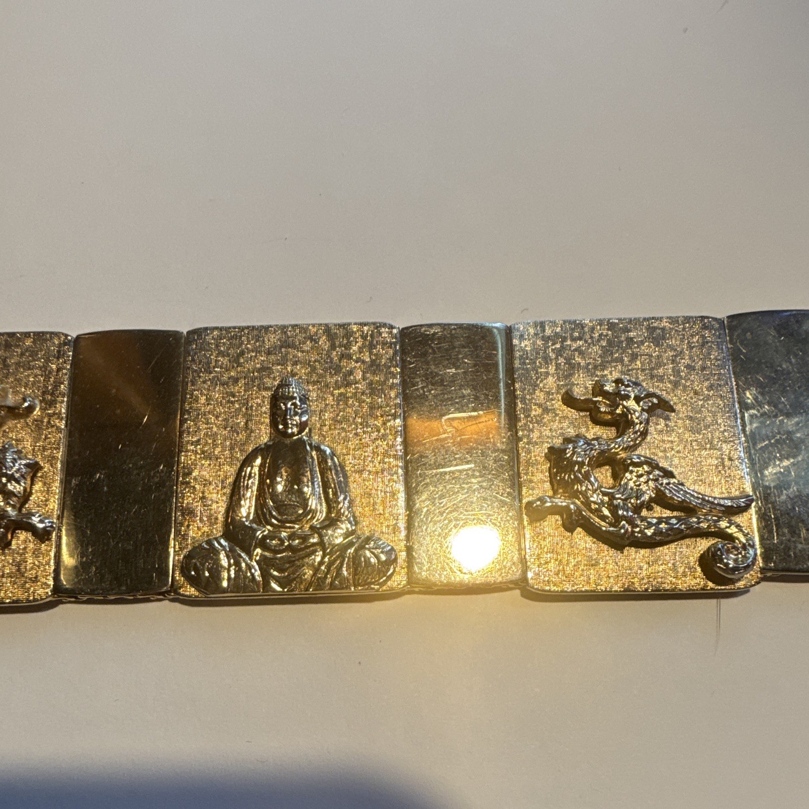VINTAGE GOLD TONE BUDDHA DRAGON PANEL LINK BRACELET WITH SAFETY CHAIN