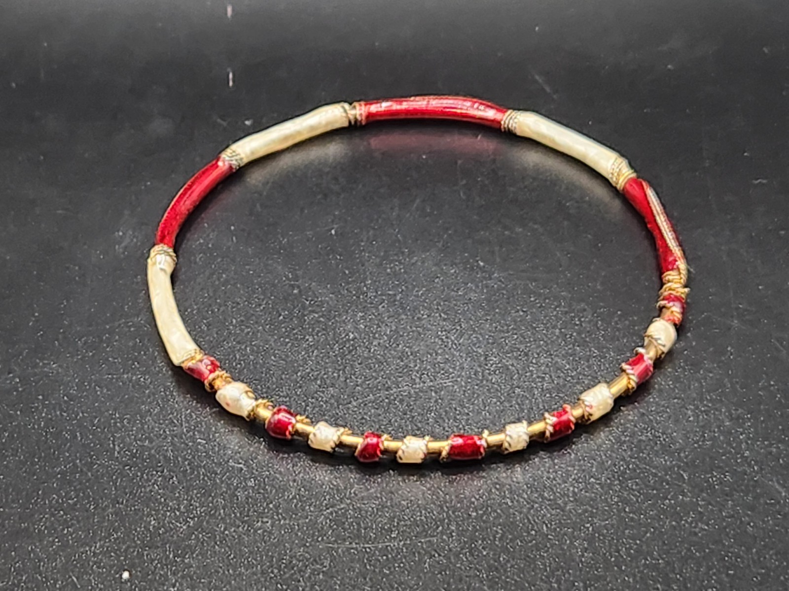 #0375 – Red Ivory Gold Tone Bangle Bracelet Size 7.5 Segmented Enamel Style 7g