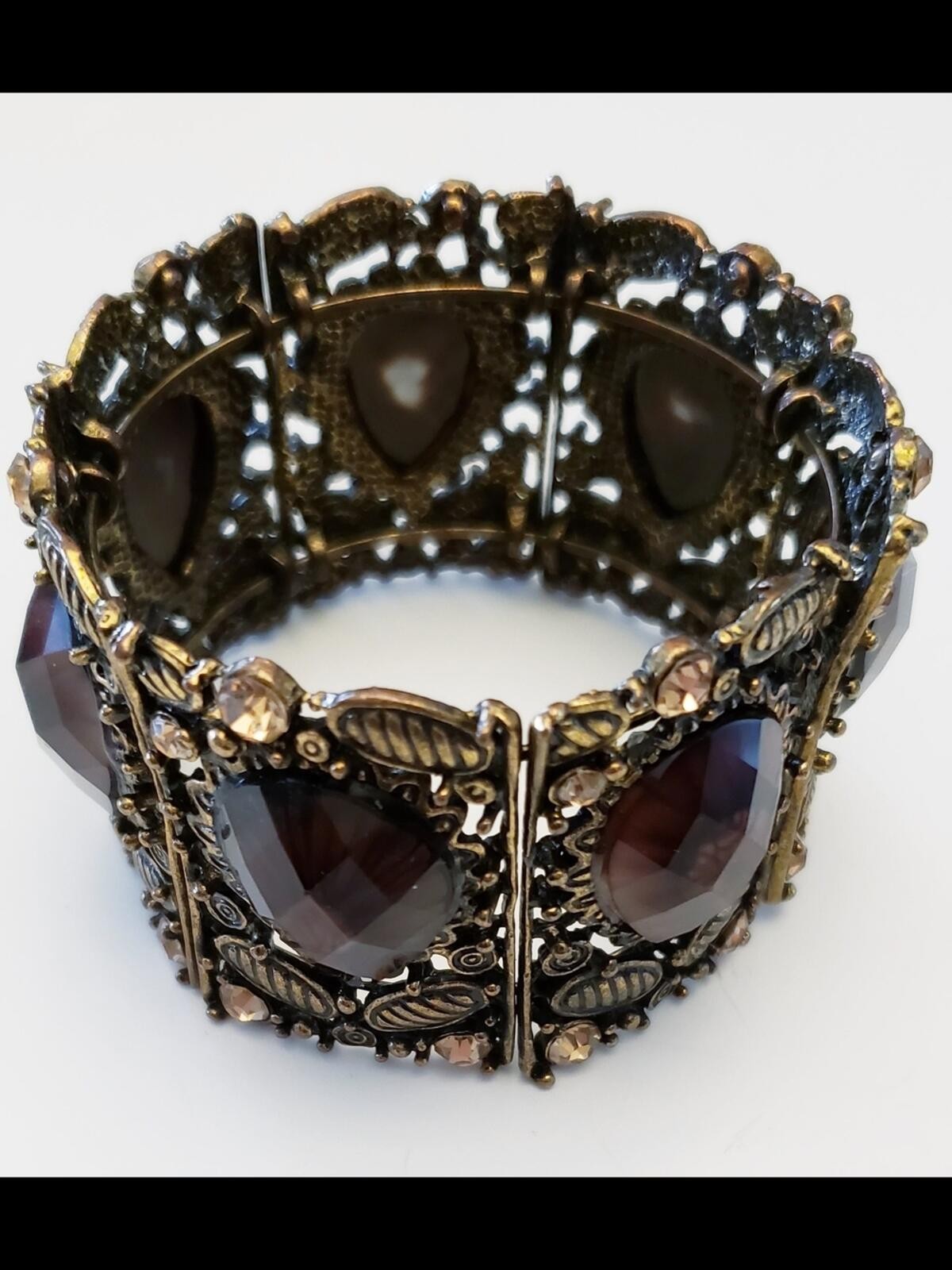 Vintage Wide Bracelet with Faceted Brown Stones and Ornate Metalwork