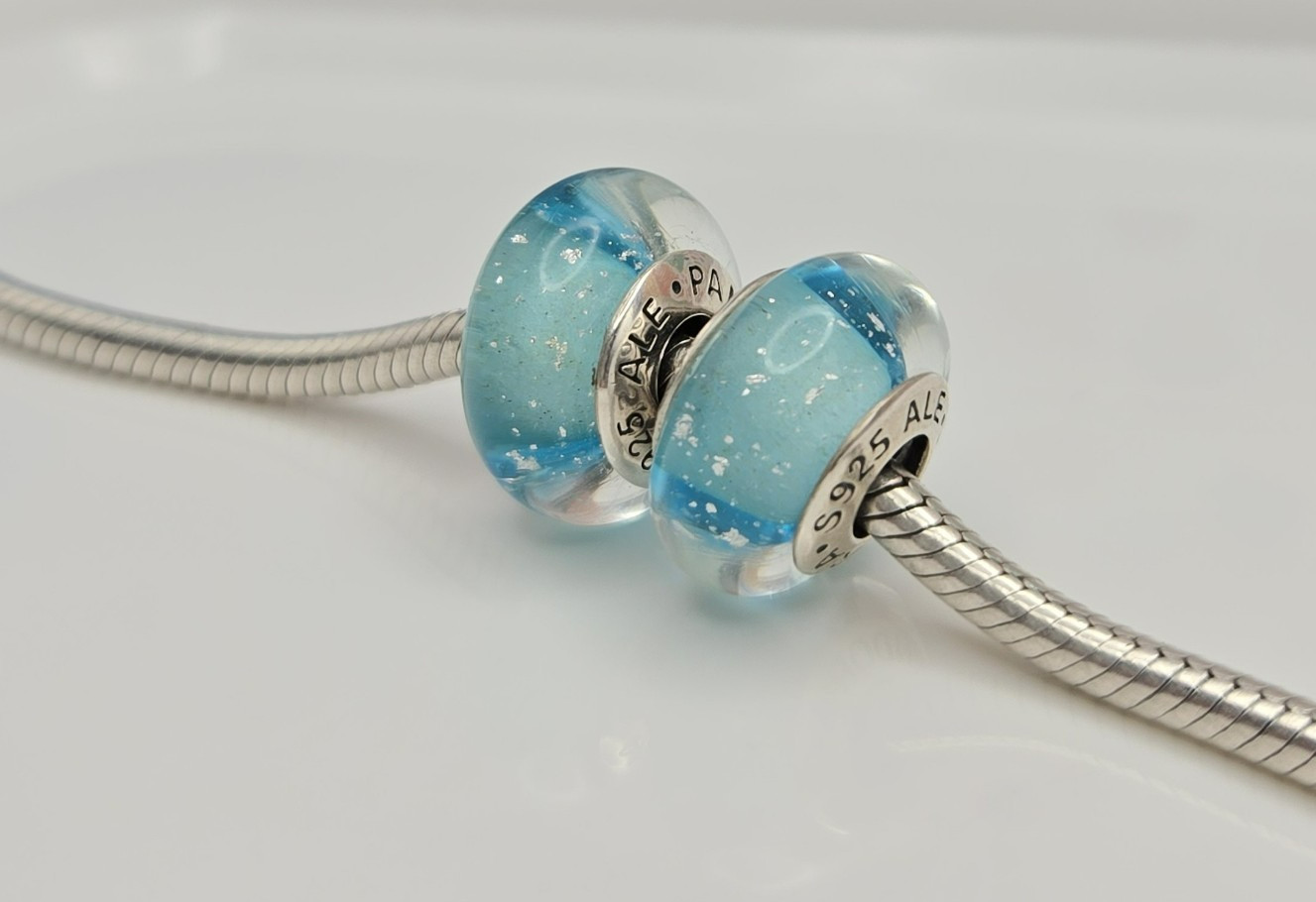 Authentic Pandora Pair of Disney ELSA blue Charms Murano Glass