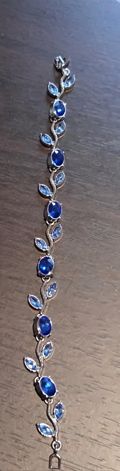 Stainlesteel Leaf Pattern Bracelet With Blue Rhinestones $28.95