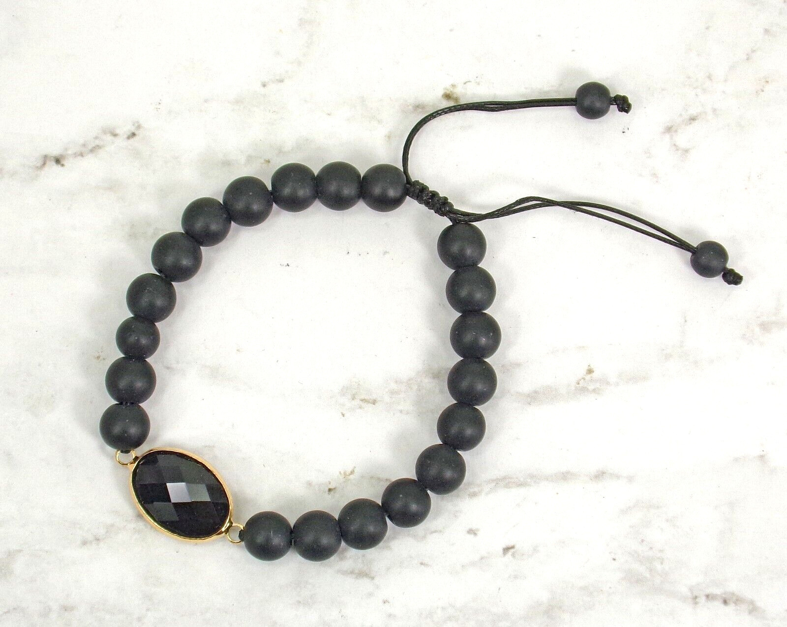 Black stone bead bracelet with black glass bead and adjustable size tie back New